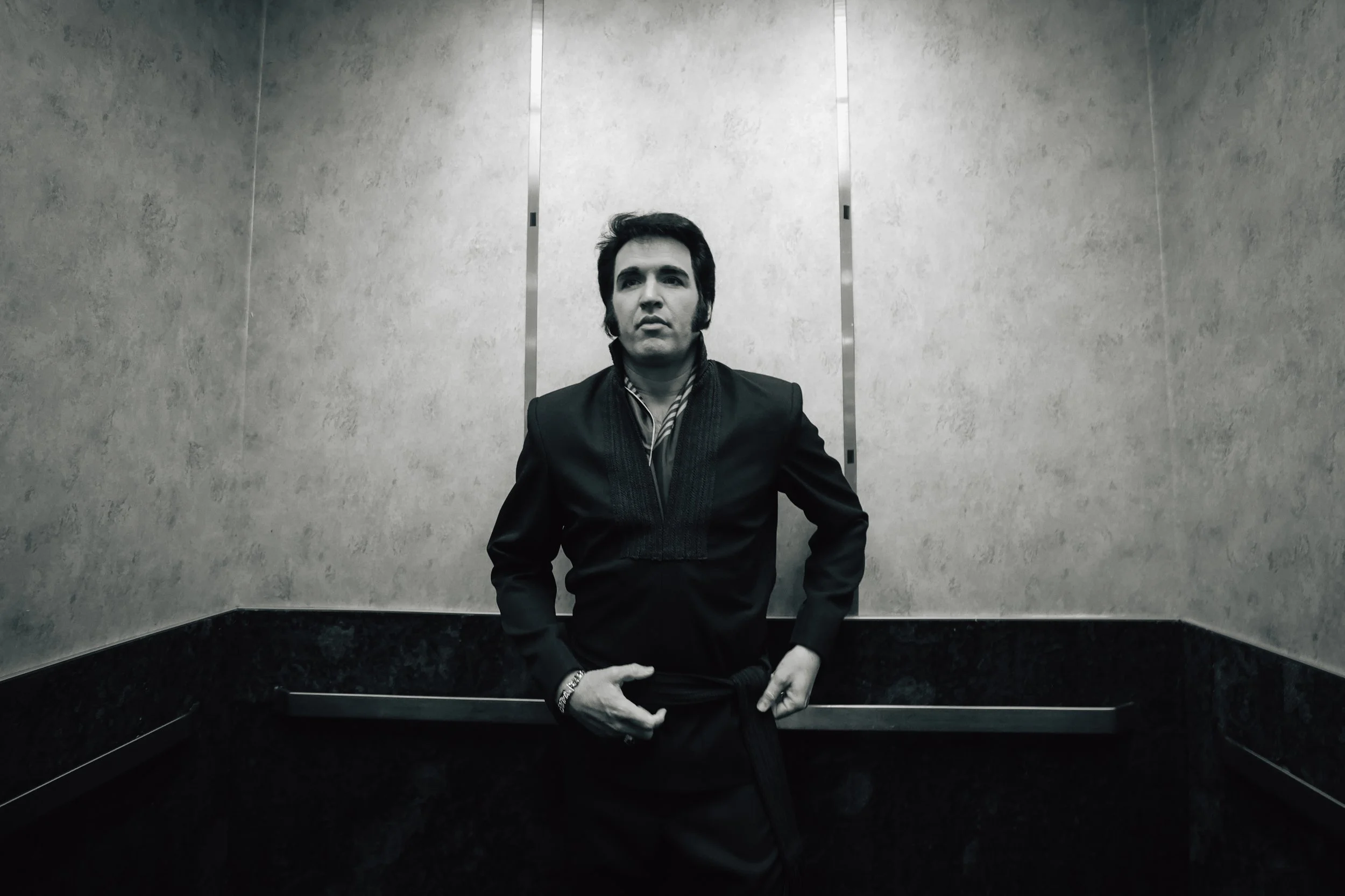 Travis Powell, an Elvis tribute artist, goes up the the same elevator that Elvis Presley used before performing in “1969 Live Concert: The King Returns” at the Westgate International Theater Thursday, July 31, 2025, in Las Vegas. The theater is the s