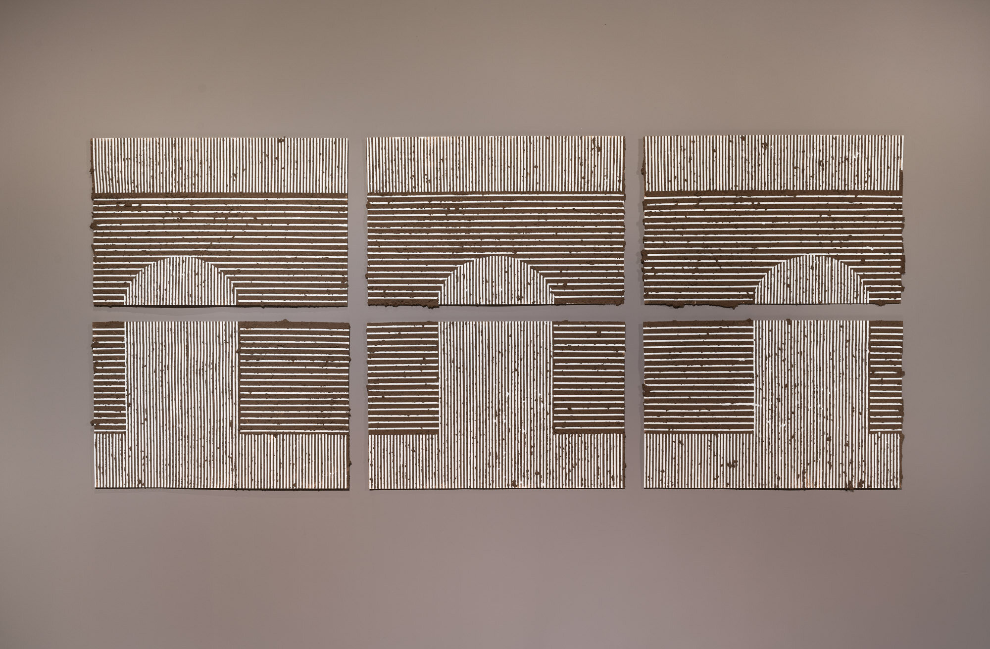   False Arch–The Span of An Opening&nbsp; 2021 Hexaptych, adobe mud and graphite on paper.&nbsp;120 × 52&nbsp;inches 