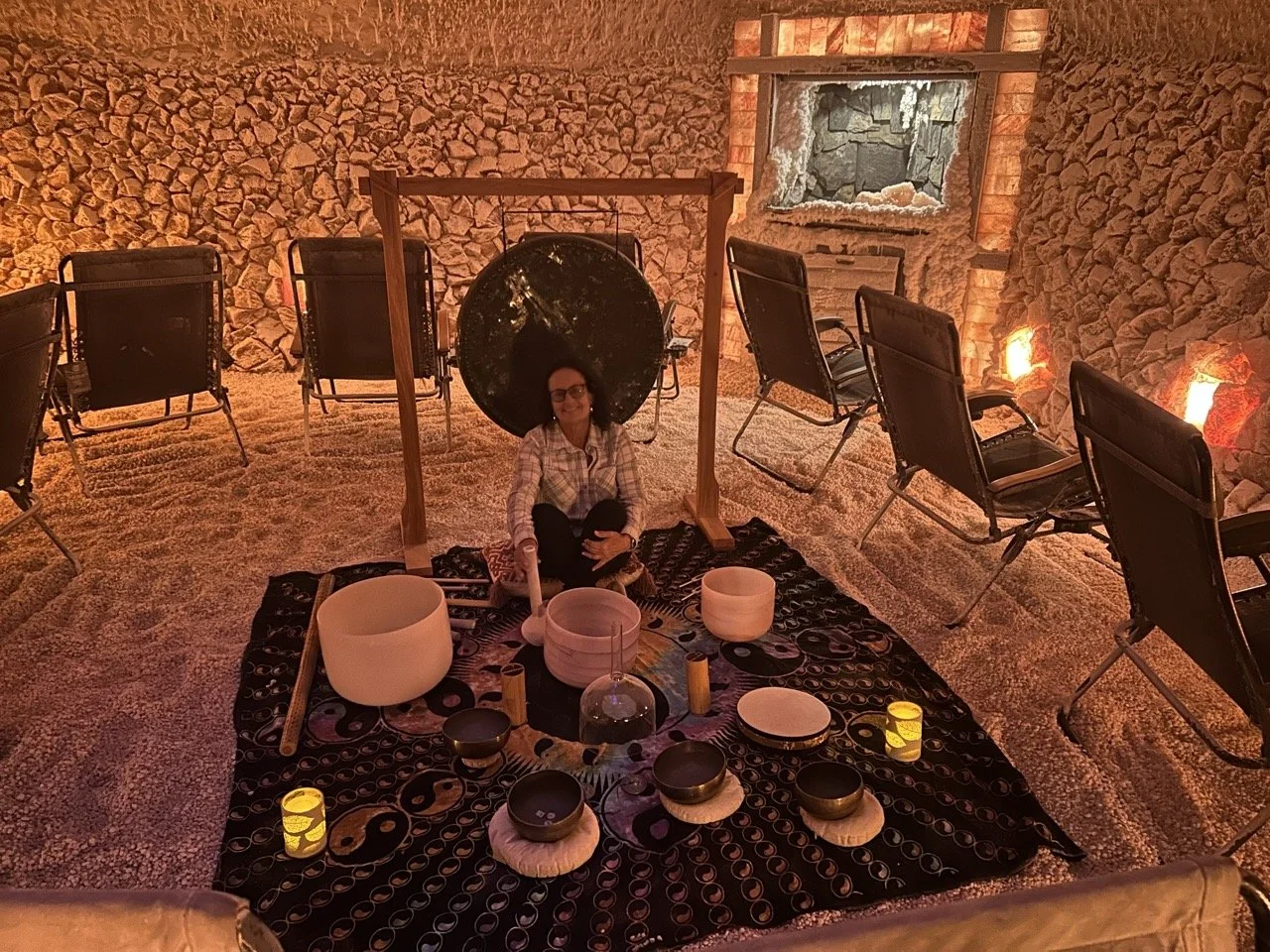 Vibrational sound therapy instruments set up inside a salt cave