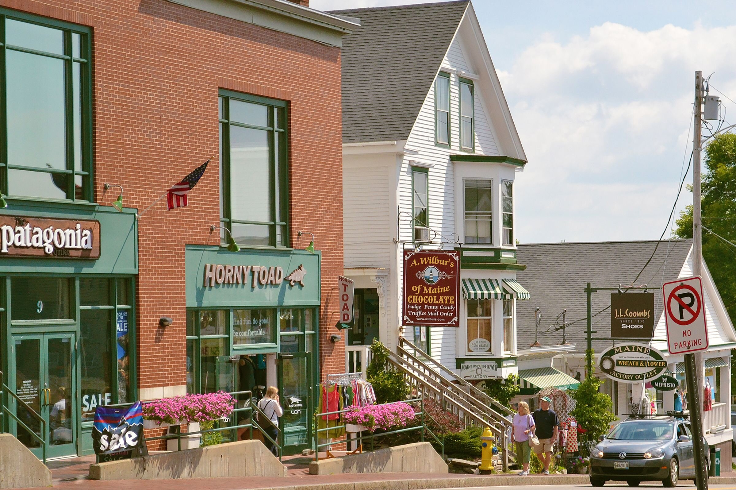 The Horny Toad and A. Wilbur's of Maine Chocolate store fronts in Freeport Maine 