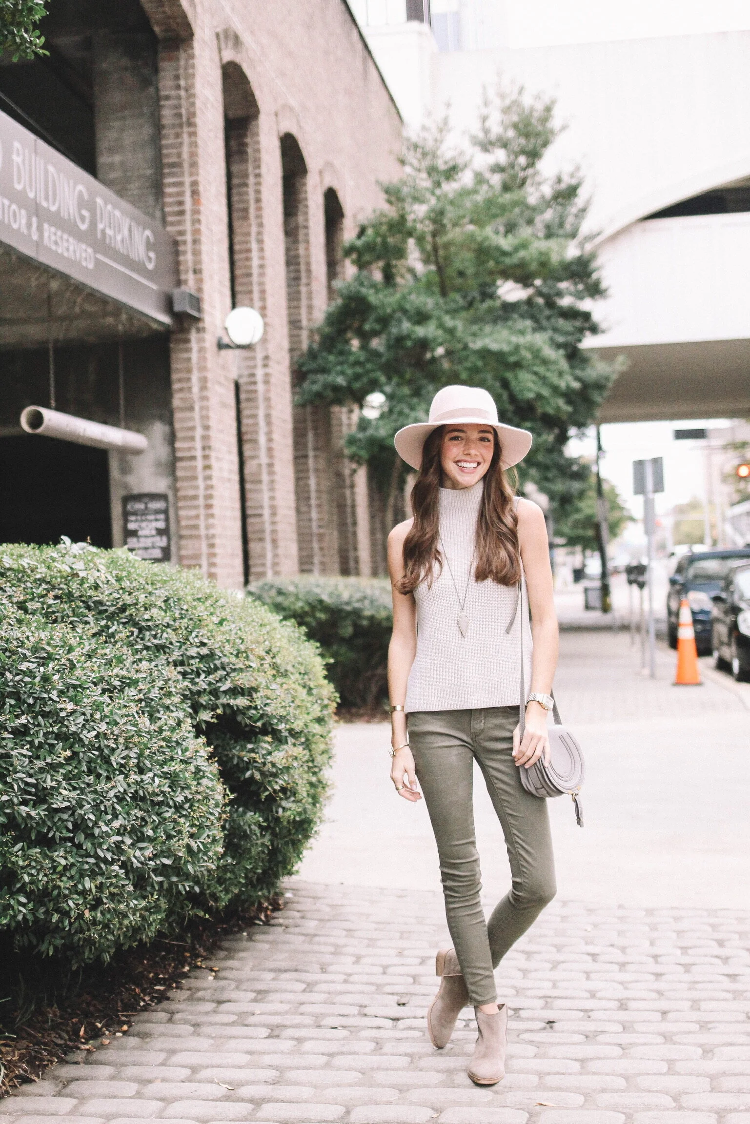 How to Wear a Sleeveless Sweater