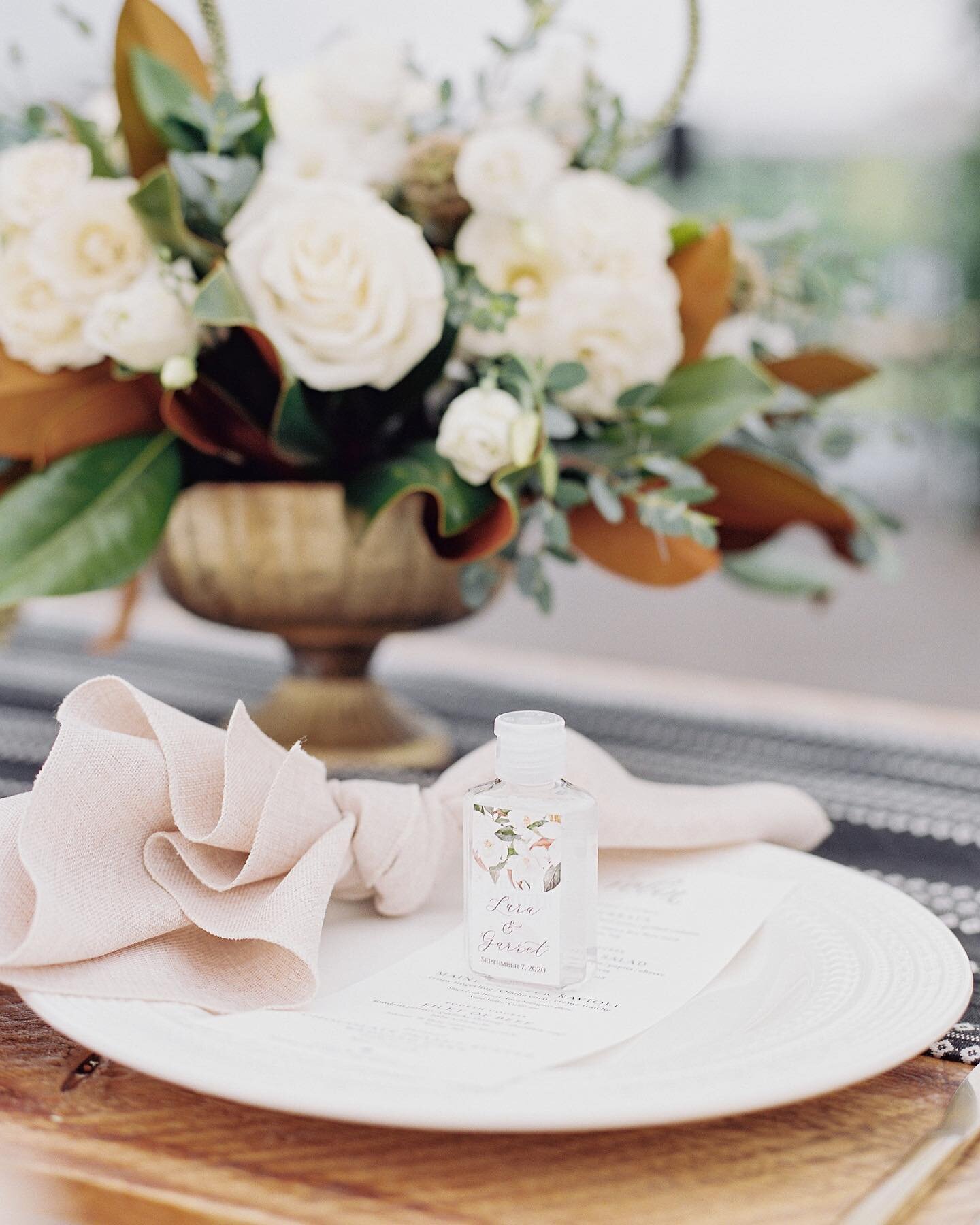 Lara and Garret made the most of their 2020 wedding and got creative with the details. How can hand sanitizer be so cute?  Venue: @blackstoneriversranch | Planner: @awevents.colorado | Florals: @petalandbean | Catering: @biscuitsandberries | Video: @