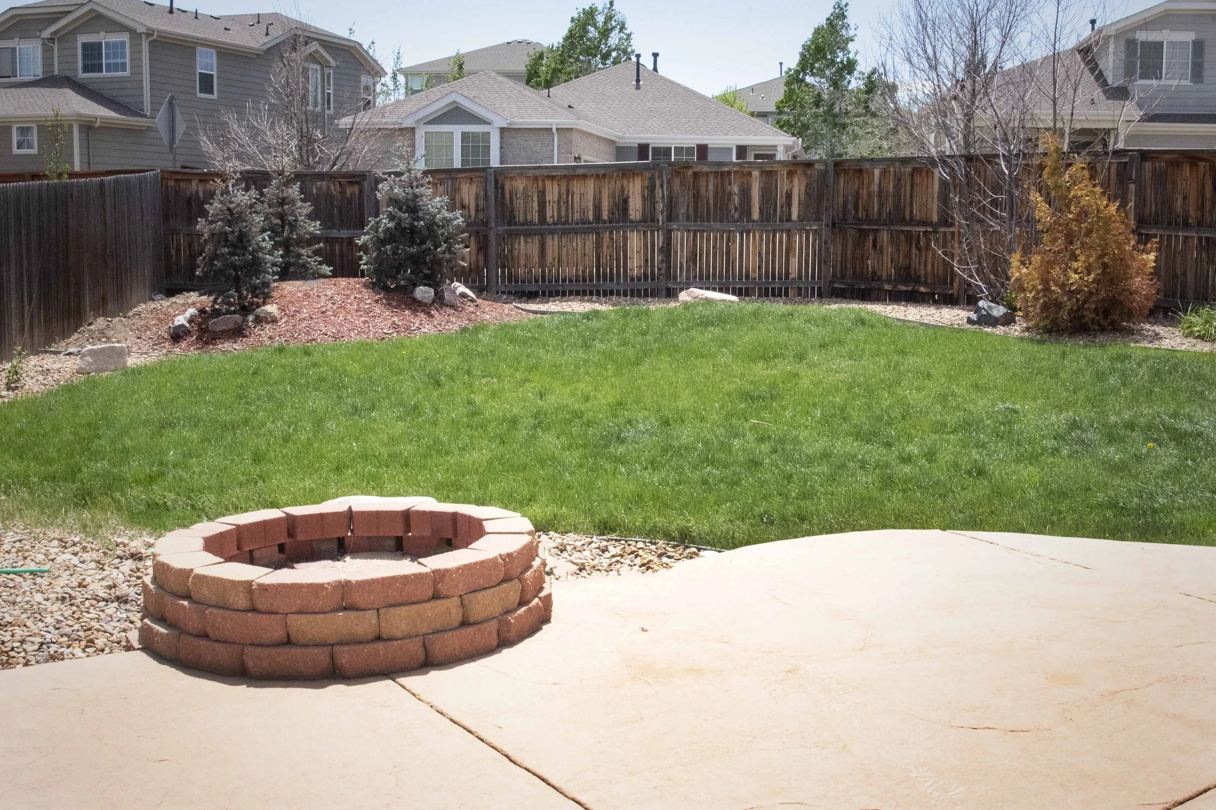 Large, fenced yard with Patio and Fire Pit