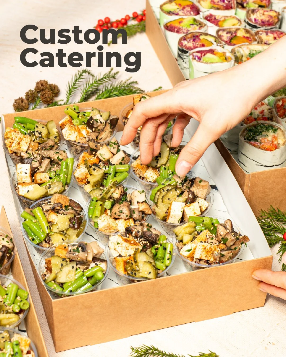 Appetizers with tomato and basil on crackers on a tray.