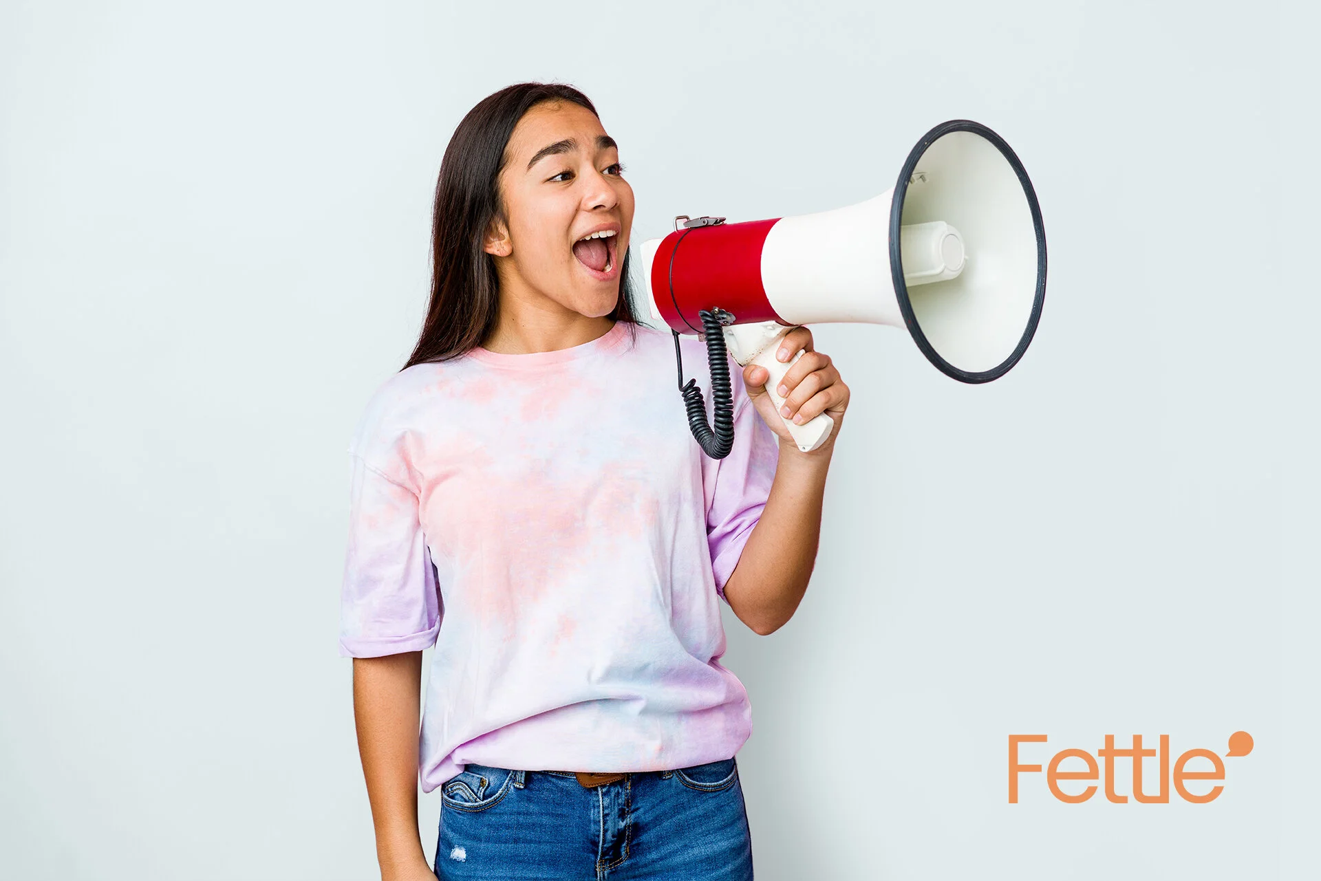  Scenic shot of the beach with waves hitting the rocks. 