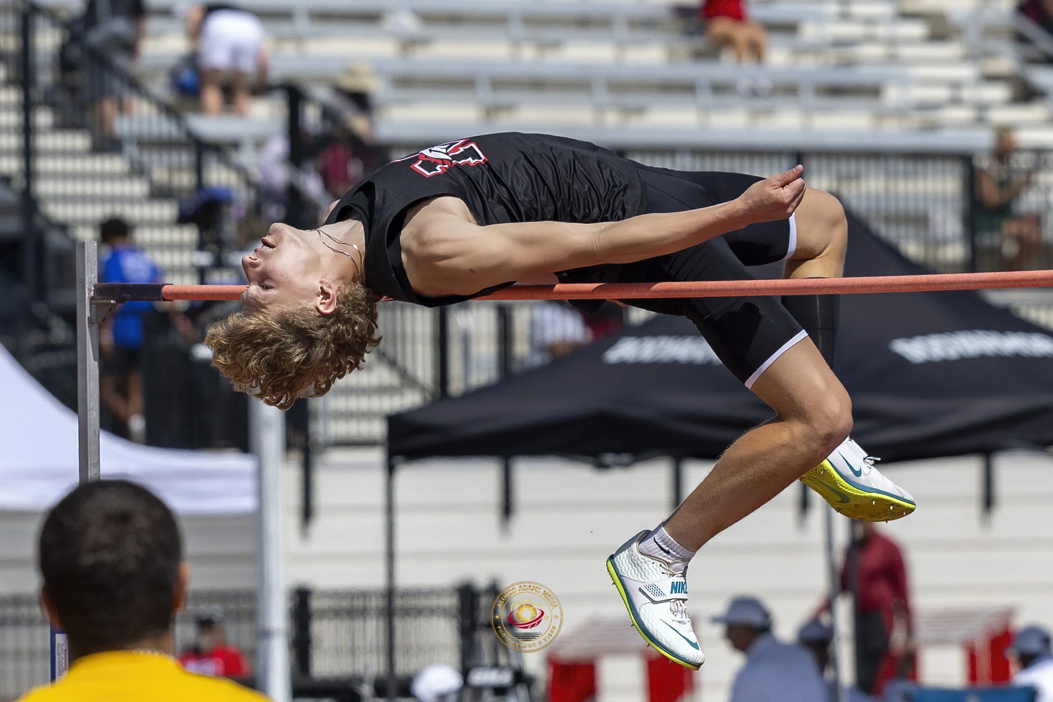 Brayden Cox sets school record indoor high jump.
