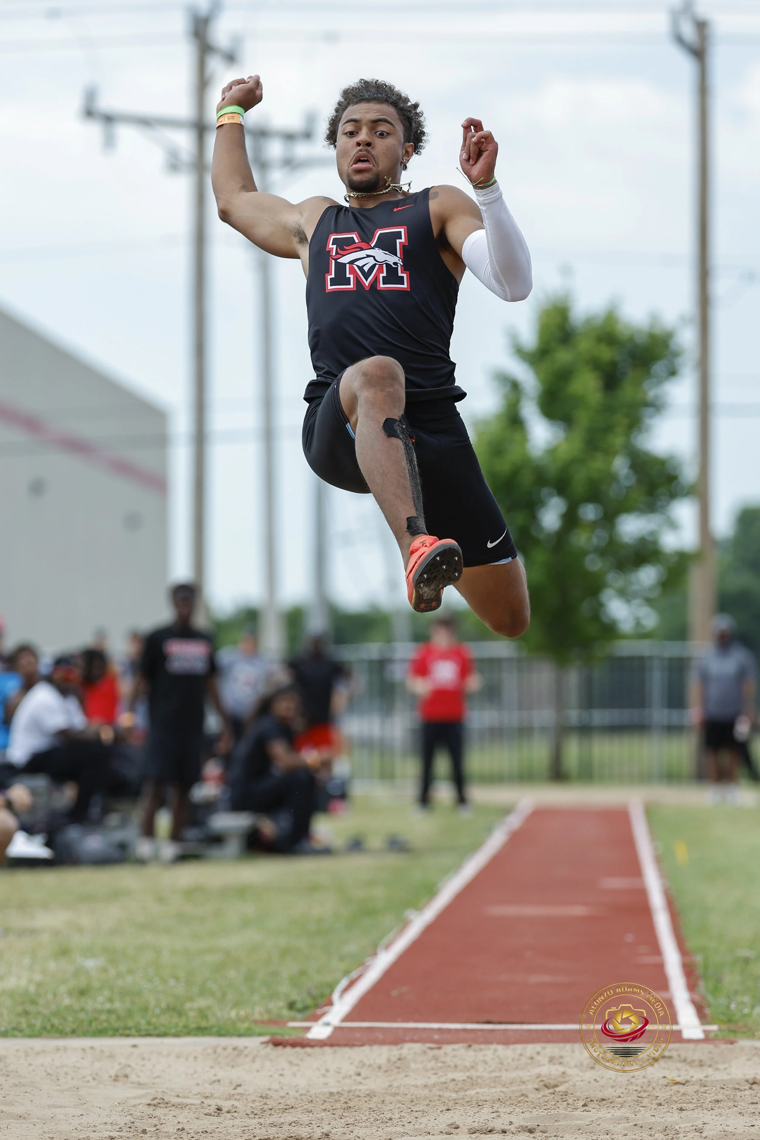 Tayten Duncan long jump at state championships