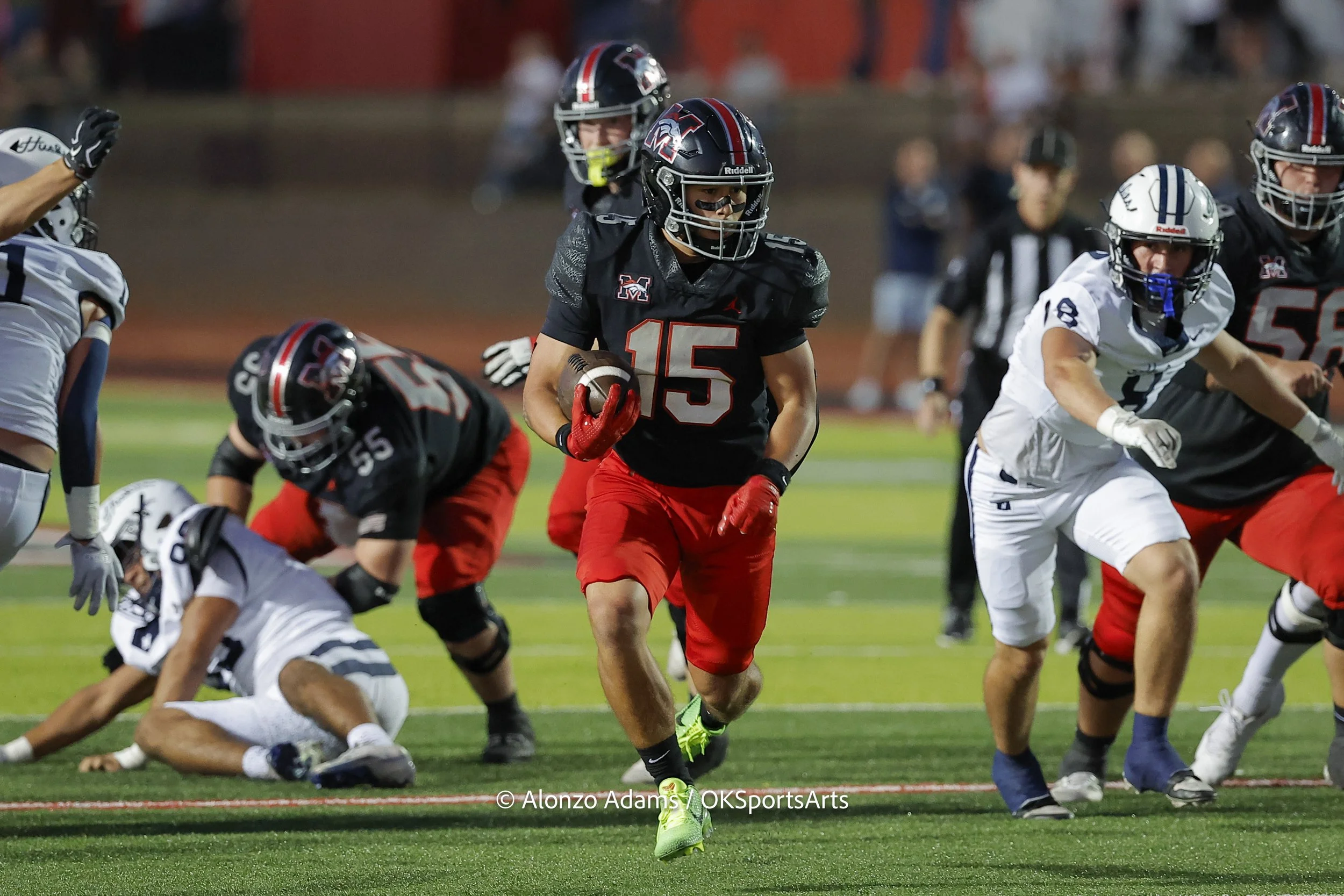 Mustang defeats Edmond North Football 54-7