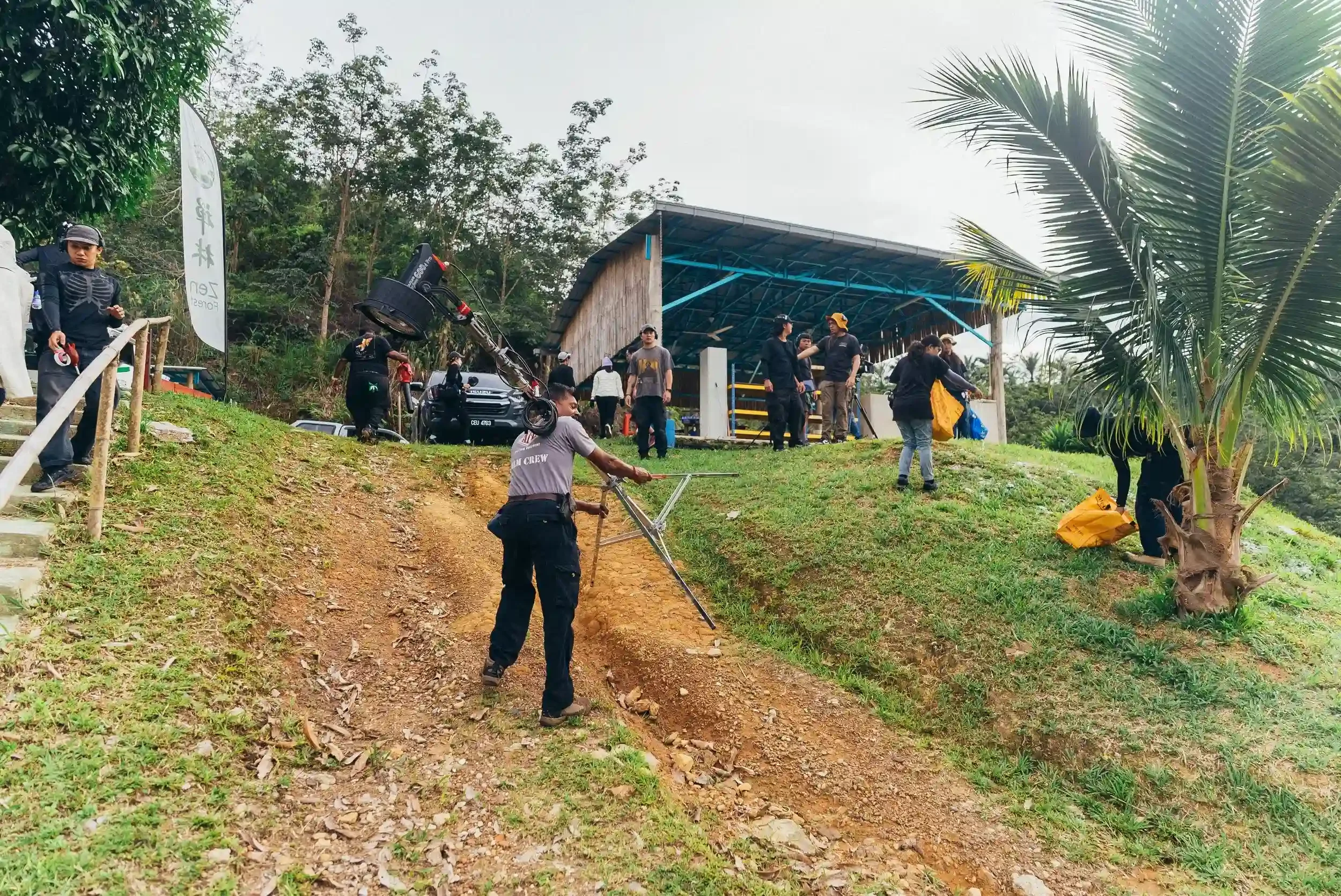 filming crews preparting the equipment for decathlon shooting.webp
