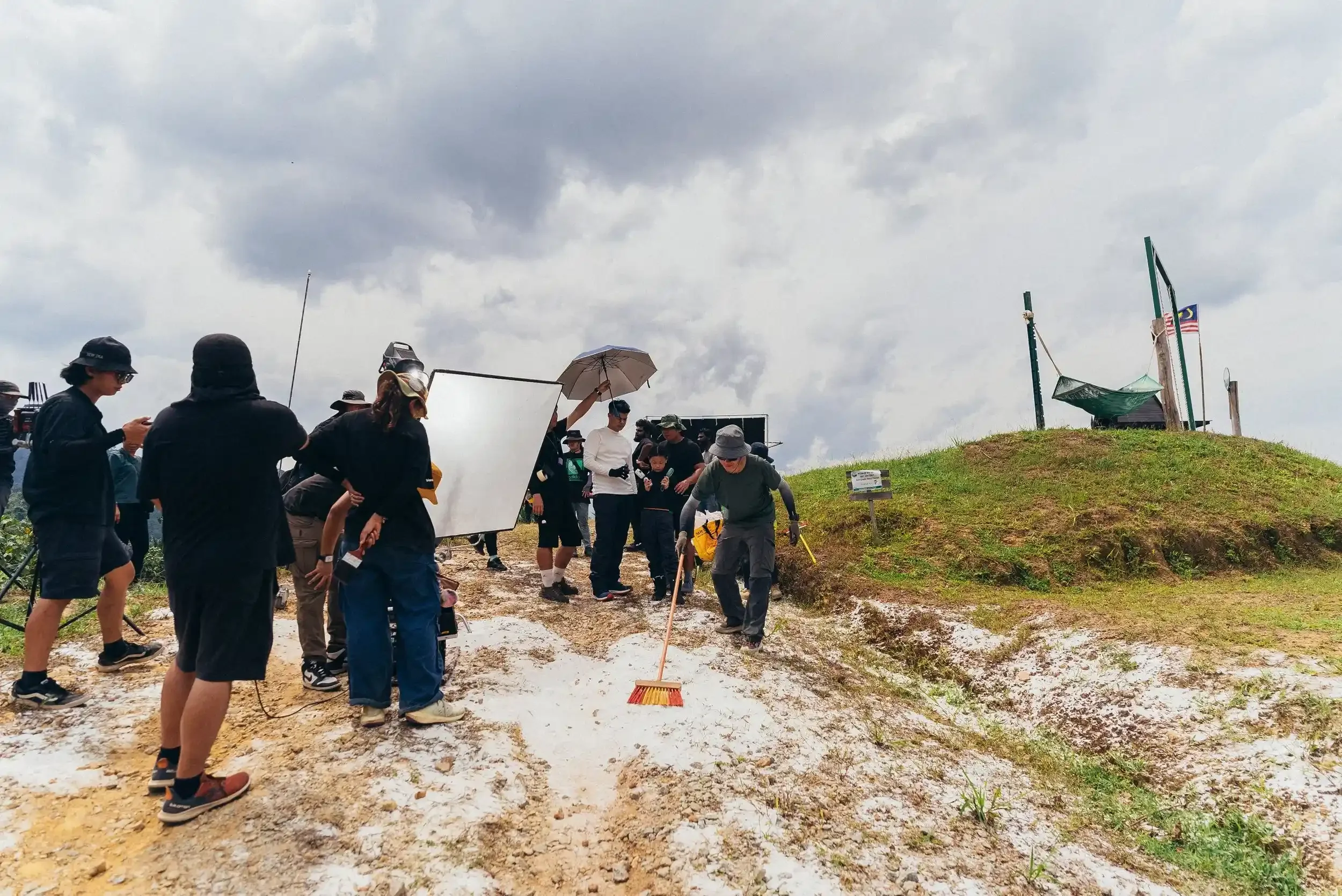 filming crews creating snow effect on decathlon filming set.webp