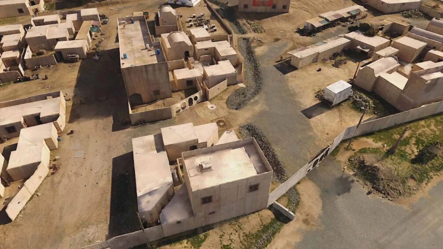 Aerial view of a compound recreated as a virtual mission rehearsal target in the OP-2 tactical training simulator