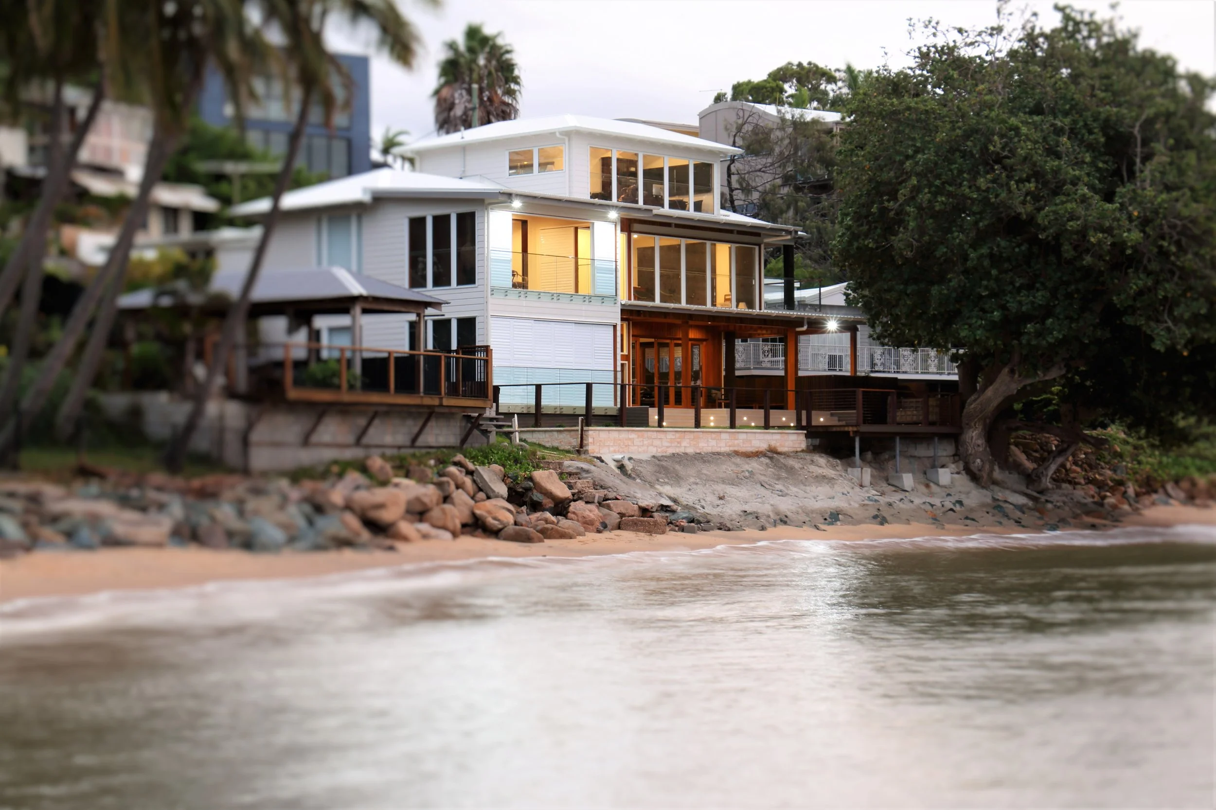 Woody Point
Redcliffe Peninsula
A beachfront house that was closed off to its views, opened up to the water and the lifestyle, with softened detailing, a new entry gatehouse and a carport that is a statement in itself.

Builder: Cornerstone Construct