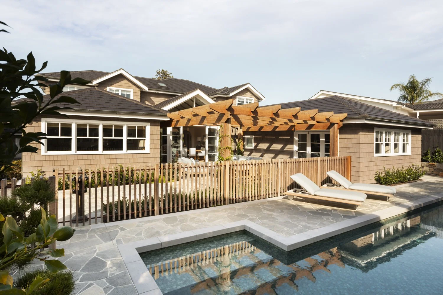 Beaumaris
Melbourne, VIC
A 1990s rendered home transformed into a timeless Cape Cod inspired family home, with raked ceilings, dormers, timber shingles and stone. Featured in Australian Home Beautiful and Trends.

Builder: Durance Construction · Inte