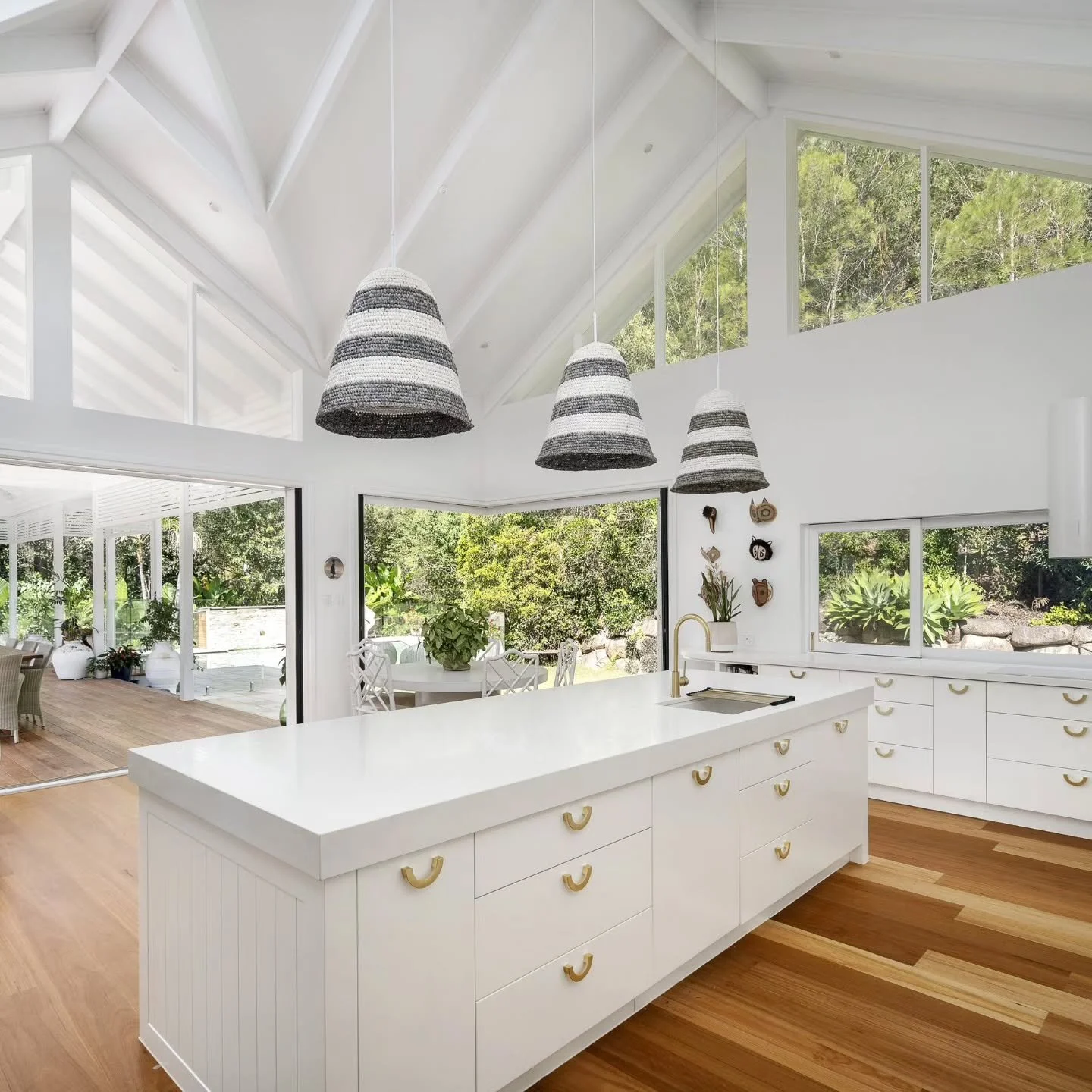 Warm minimalism, designed from the architecture out.
At The Gap House, the kitchen and new pavilion were planned as one, so the joinery, light and materials feel like they've always belonged together.

 Australian homes are moving away from cold, sho