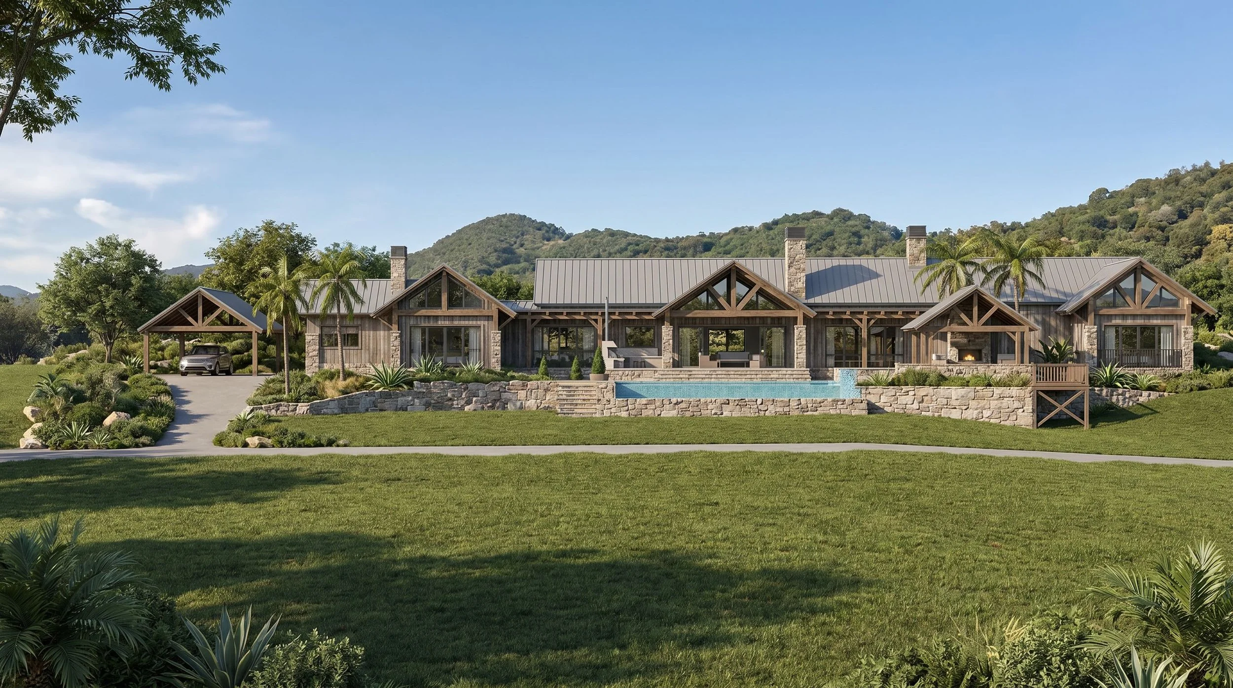 A modern, large house with a stone foundation, surrounded by lush greenery, with a mountain backdrop, a pool in front, and palm trees near the house.