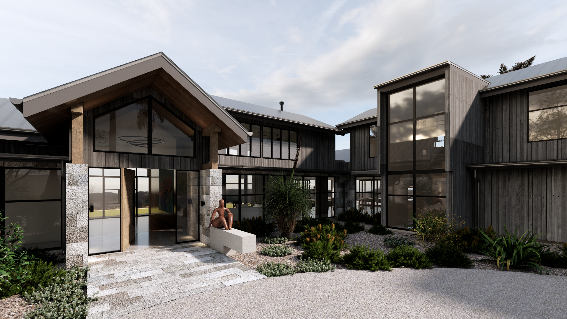 Modern house with black wooden exterior, large glass windows, and a landscaped front yard with various plants and a small sitting area.