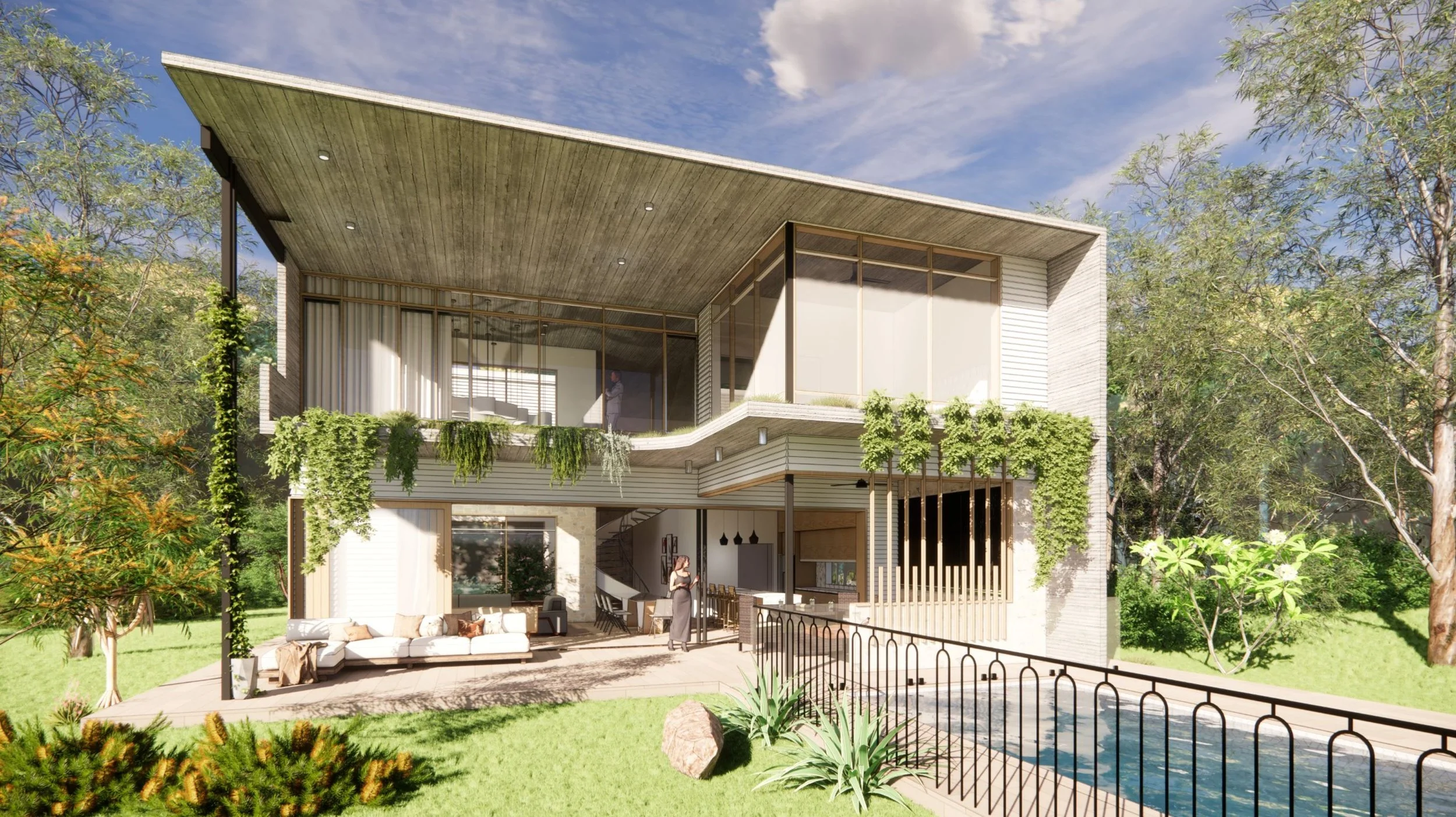 Modern two-story house with large glass windows, outdoor patio with seating, swimming pool, surrounded by greenery and trees, under a partly cloudy sky.