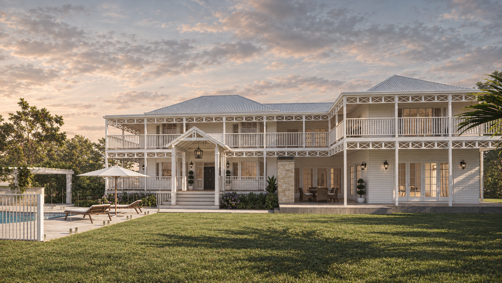 Large white multi-story house with wrap-around balconies, front stairs, and a backyard with a swimming pool and lounge chairs during sunset.
