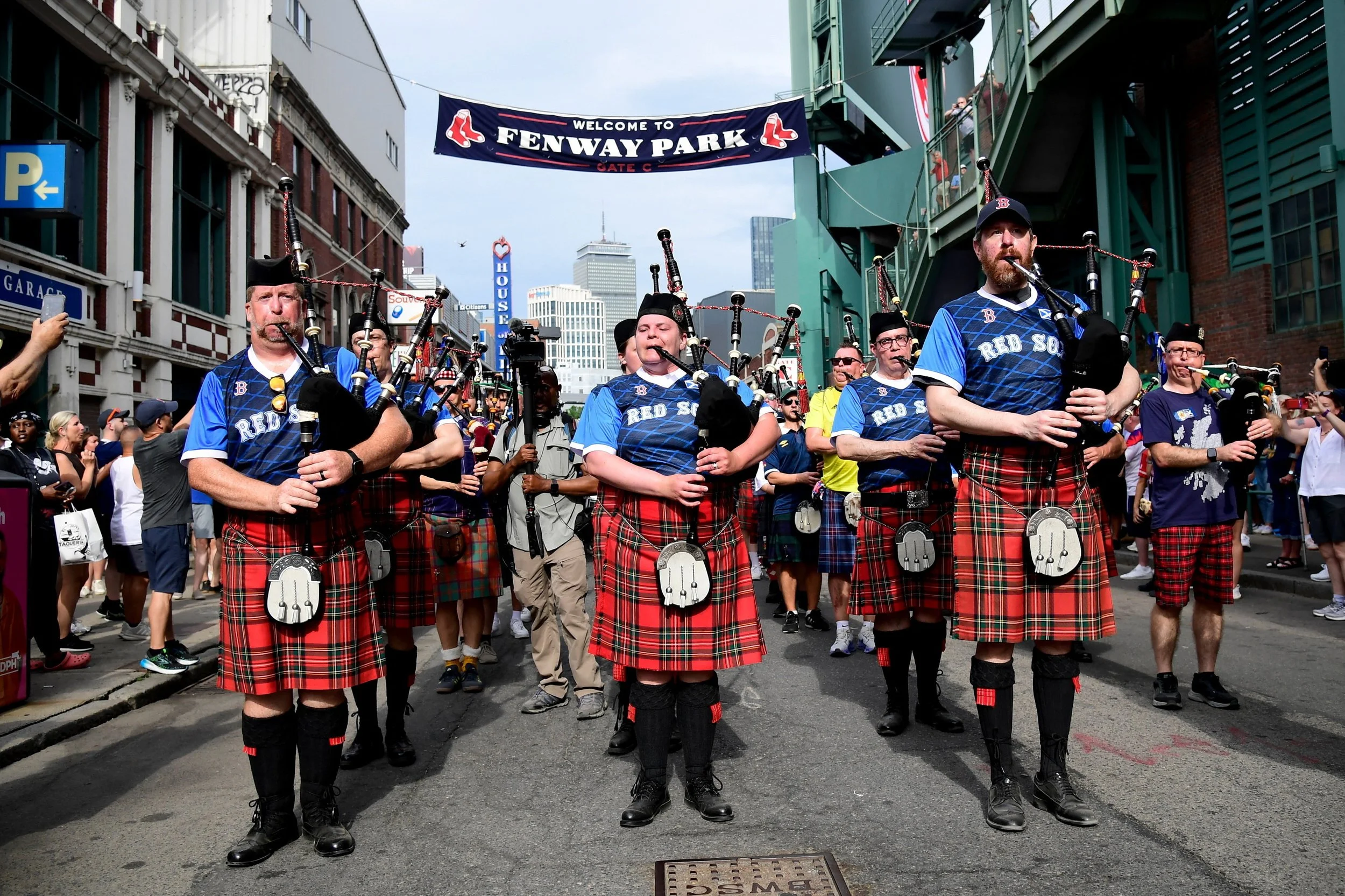 Scotland's Tartan Army march to Boston's Fenway Park baseball stadium during the 2026 World Cup