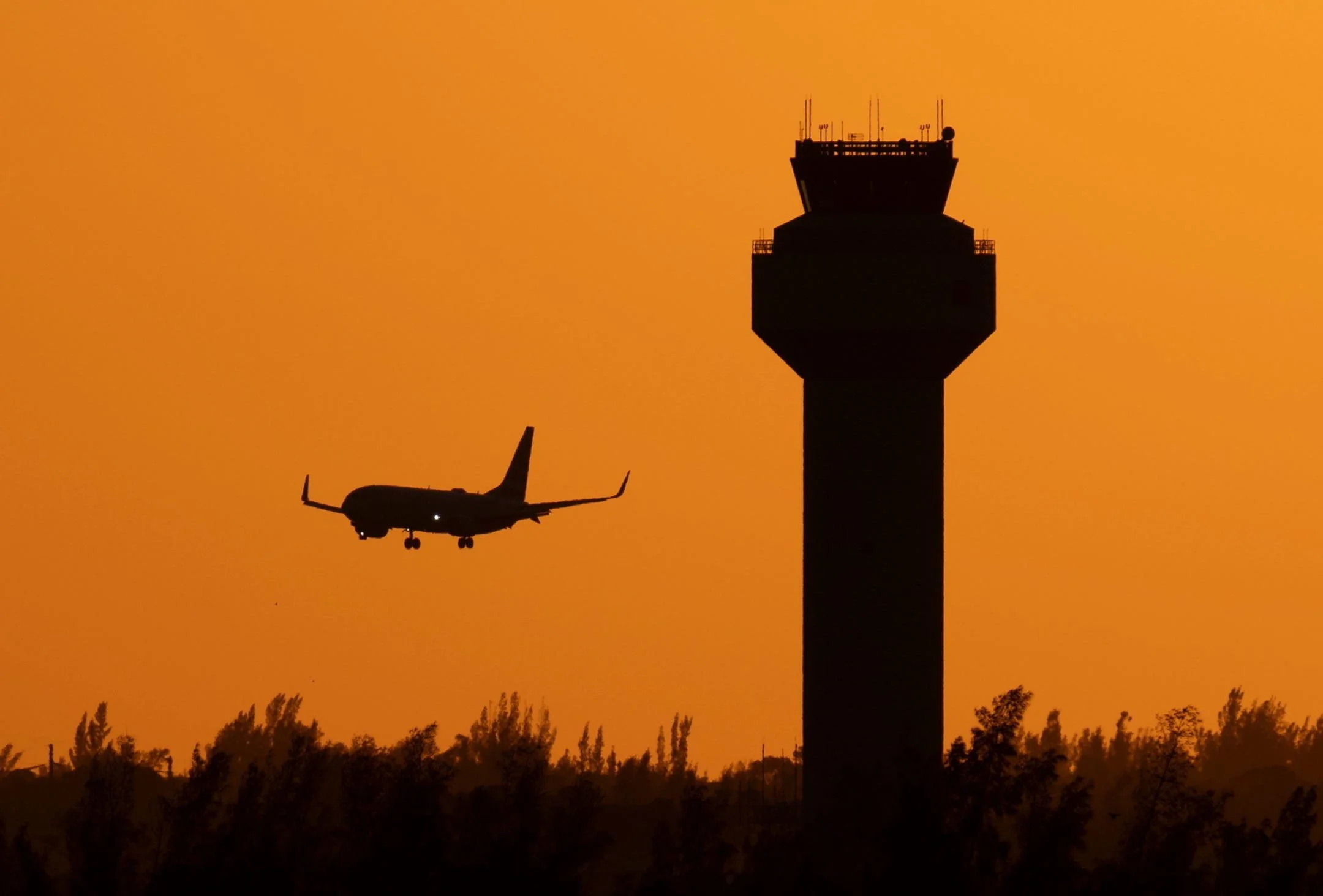 An American Airlines jet comes in for a landing at Palm Beach International Airport
