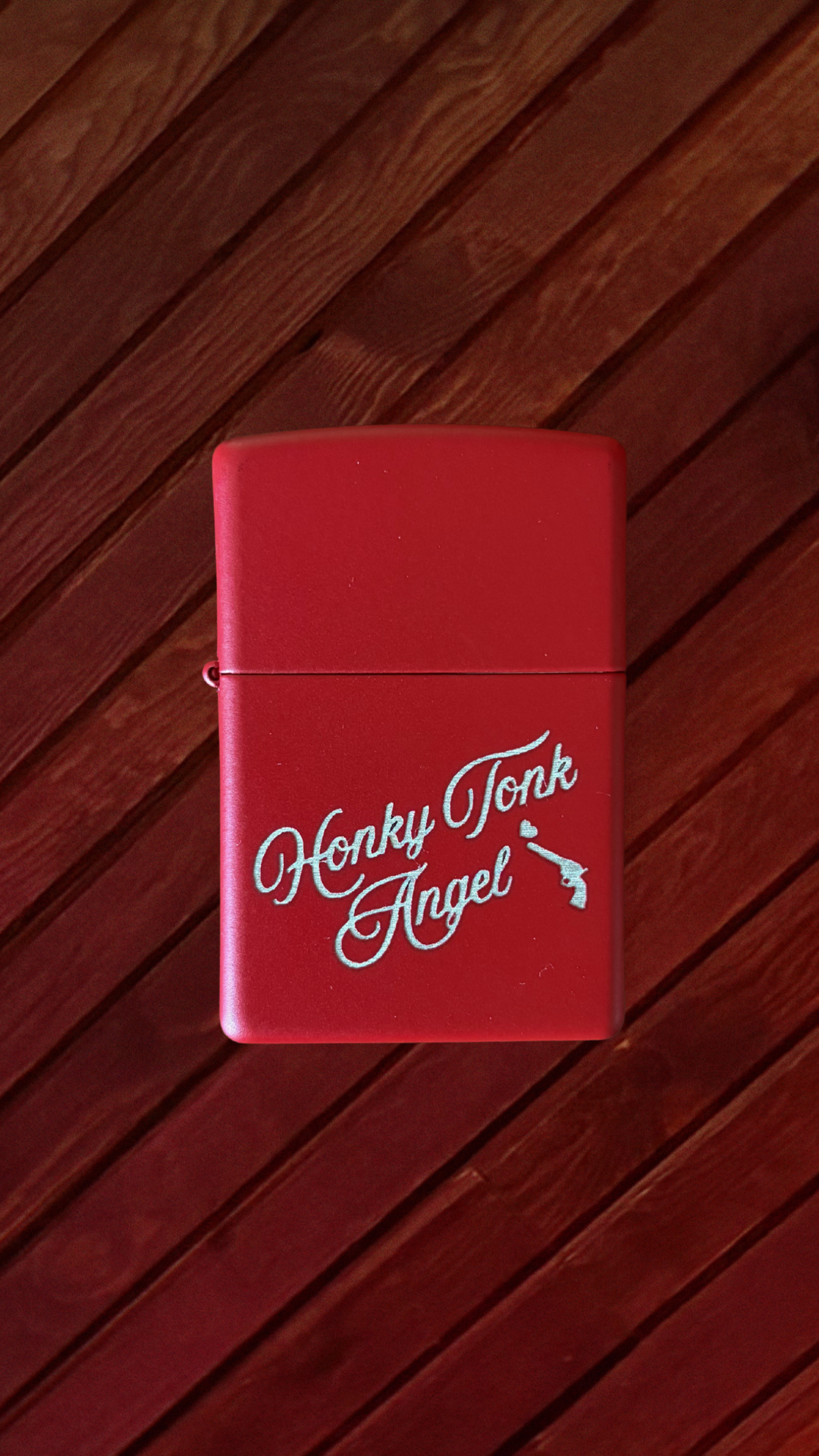 honky tonk angel zippo.png