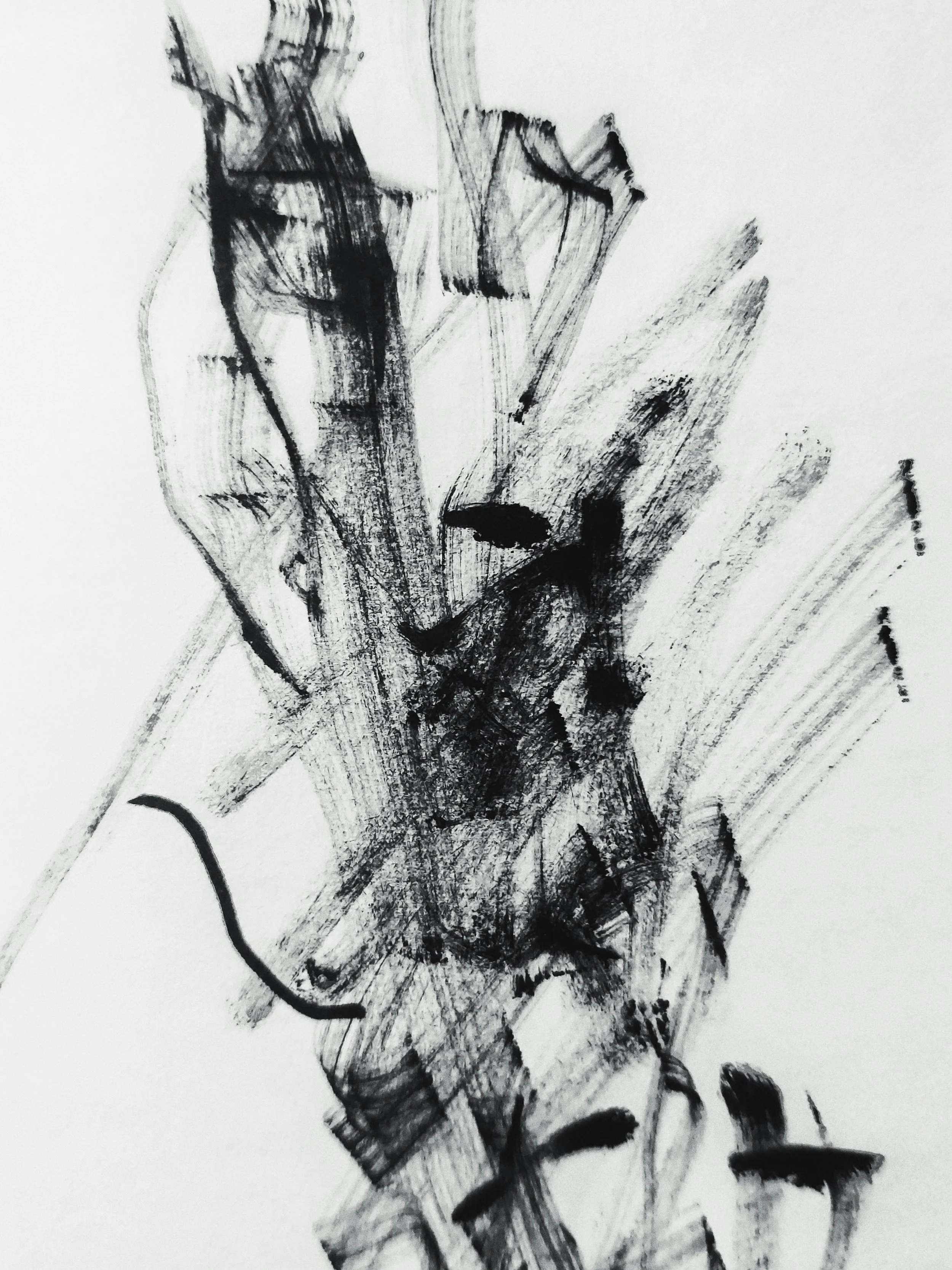 An abstract black and white ink drawing of a face with expressive brushstrokes.