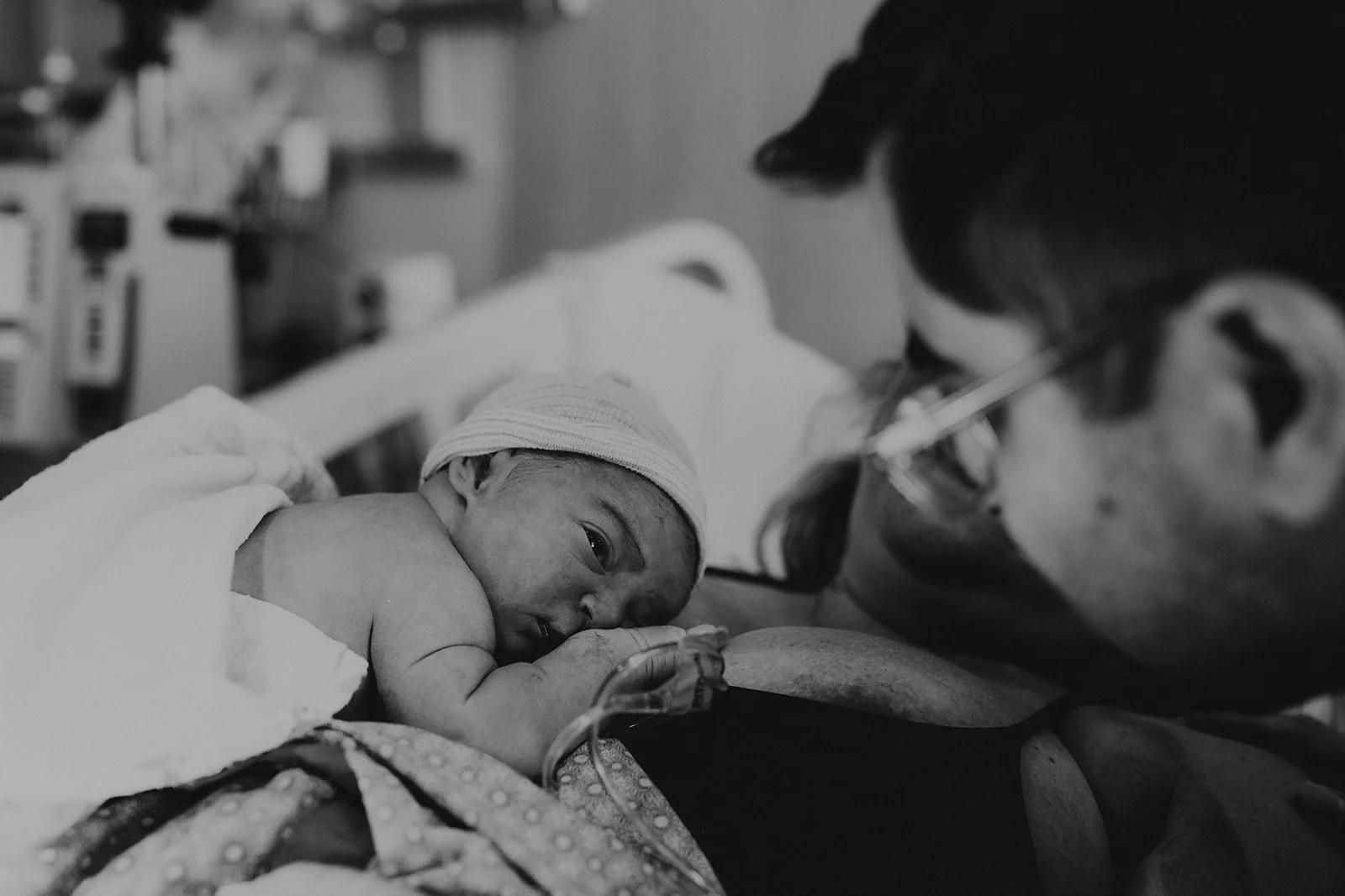 Seattle Birth Photographer — Parents Meet Newborn