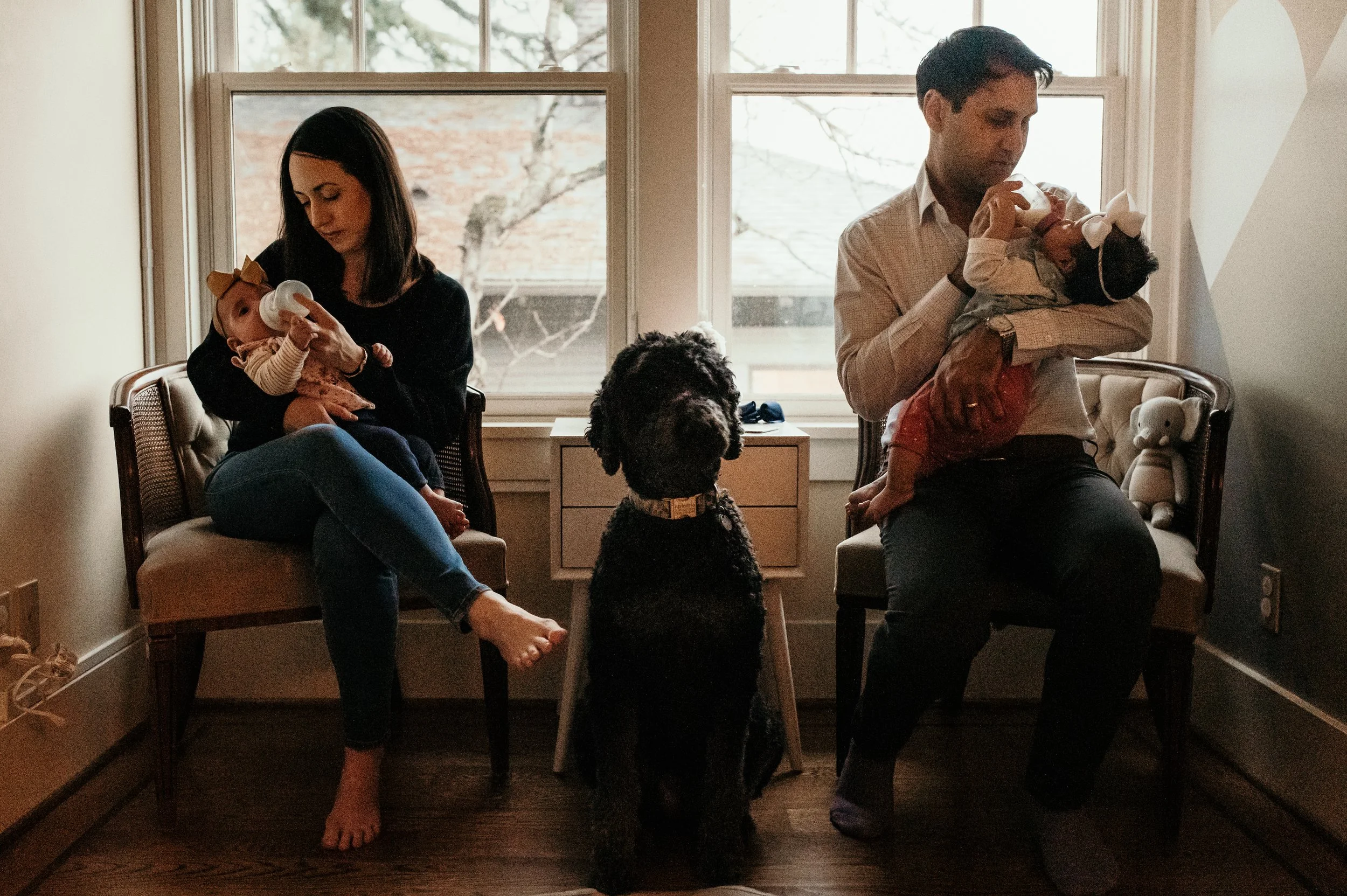 twins feeding and dog sitting watch