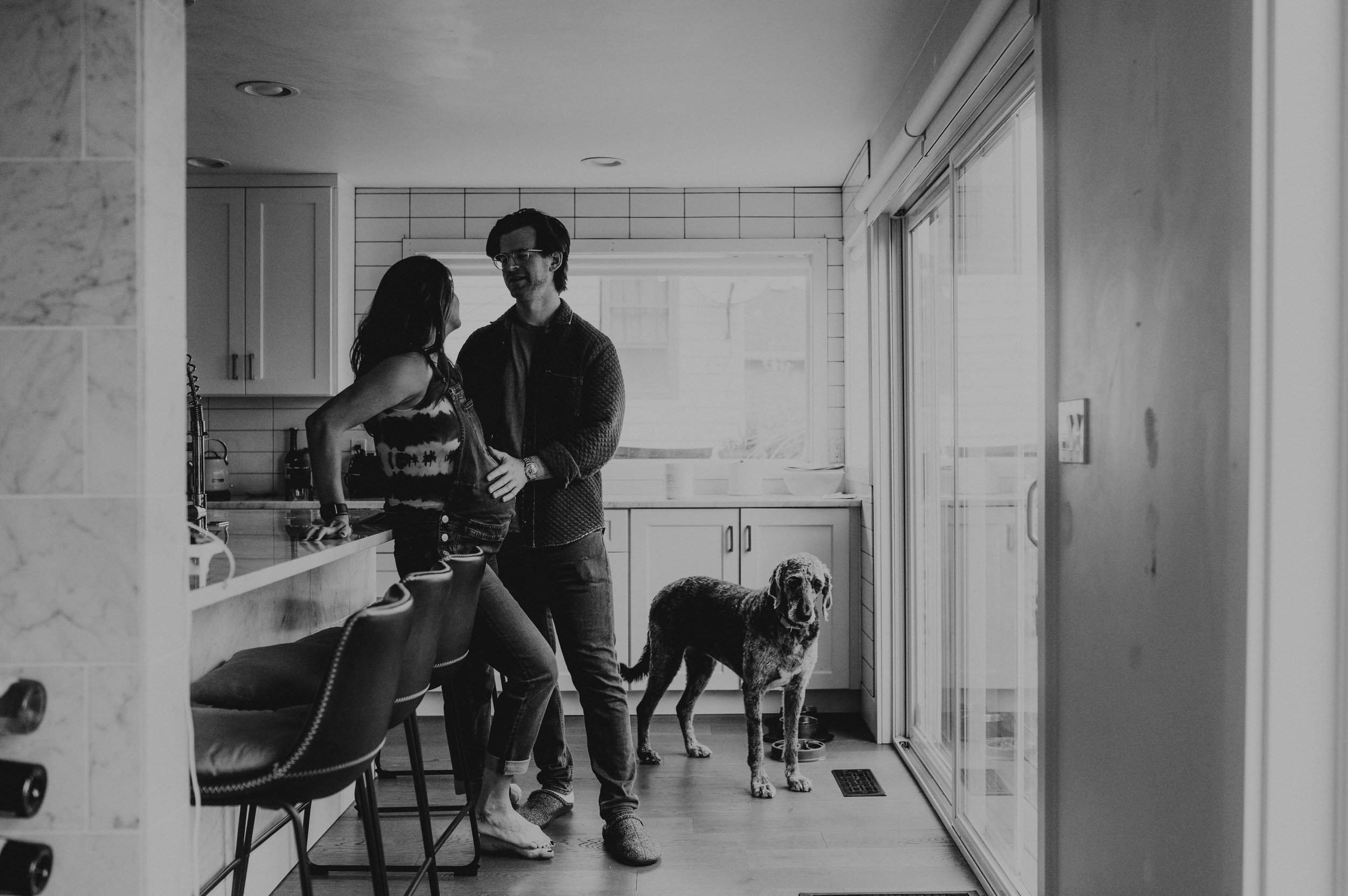 maternity in kitchen with dog