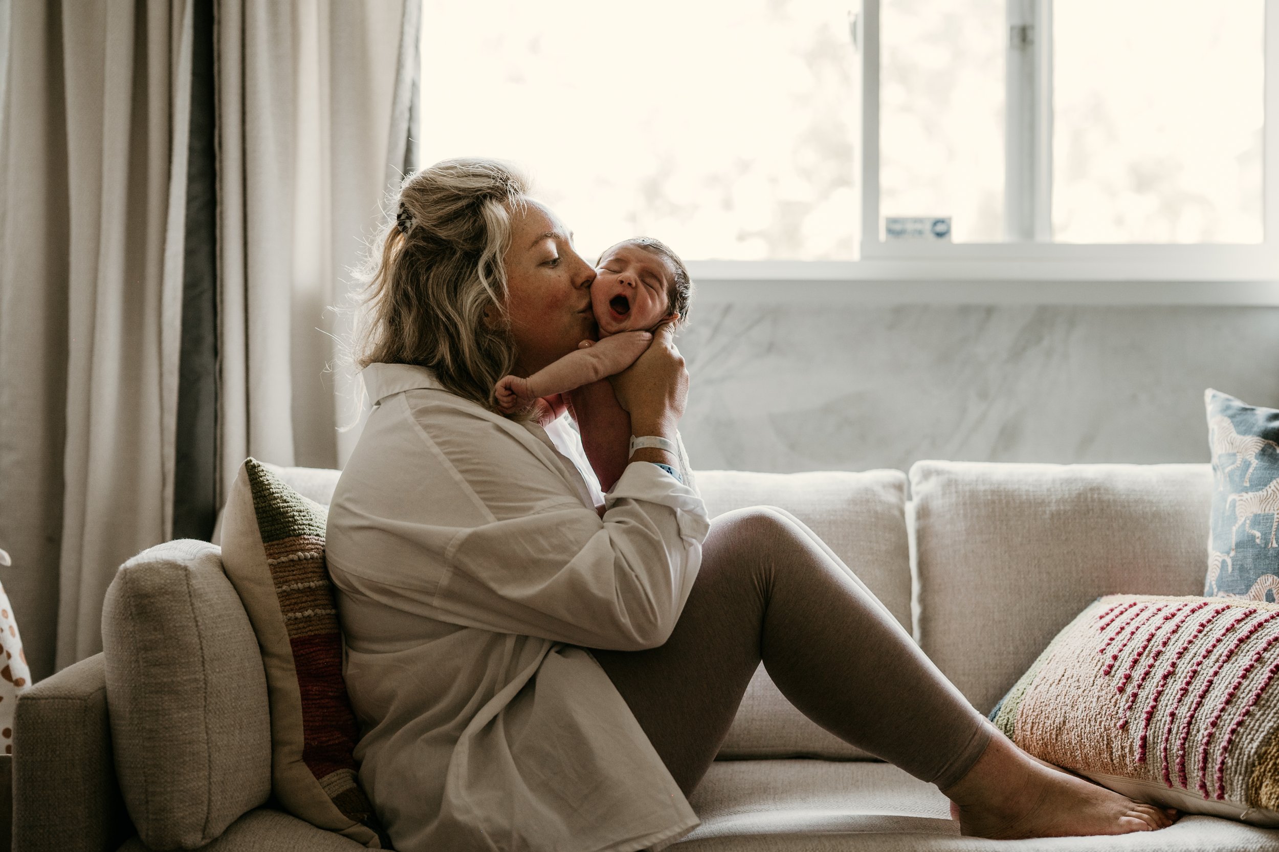 mother and newborn in home photography