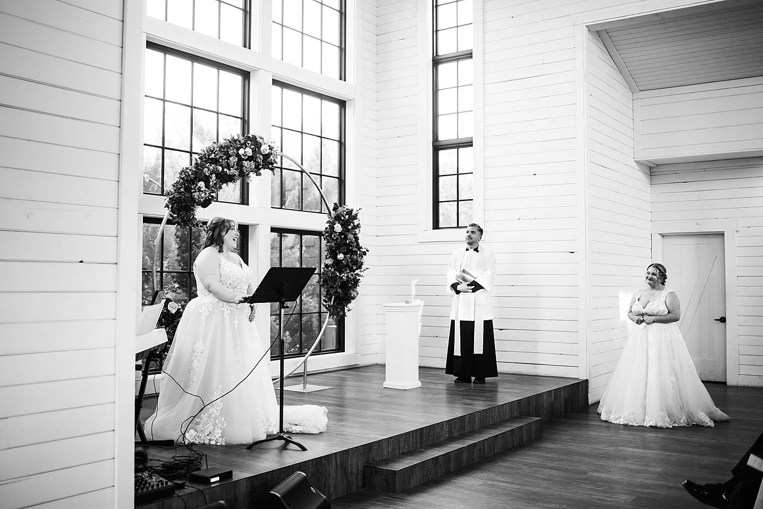 woman sings to her new wife during ceremony by Shelley Elena Photography