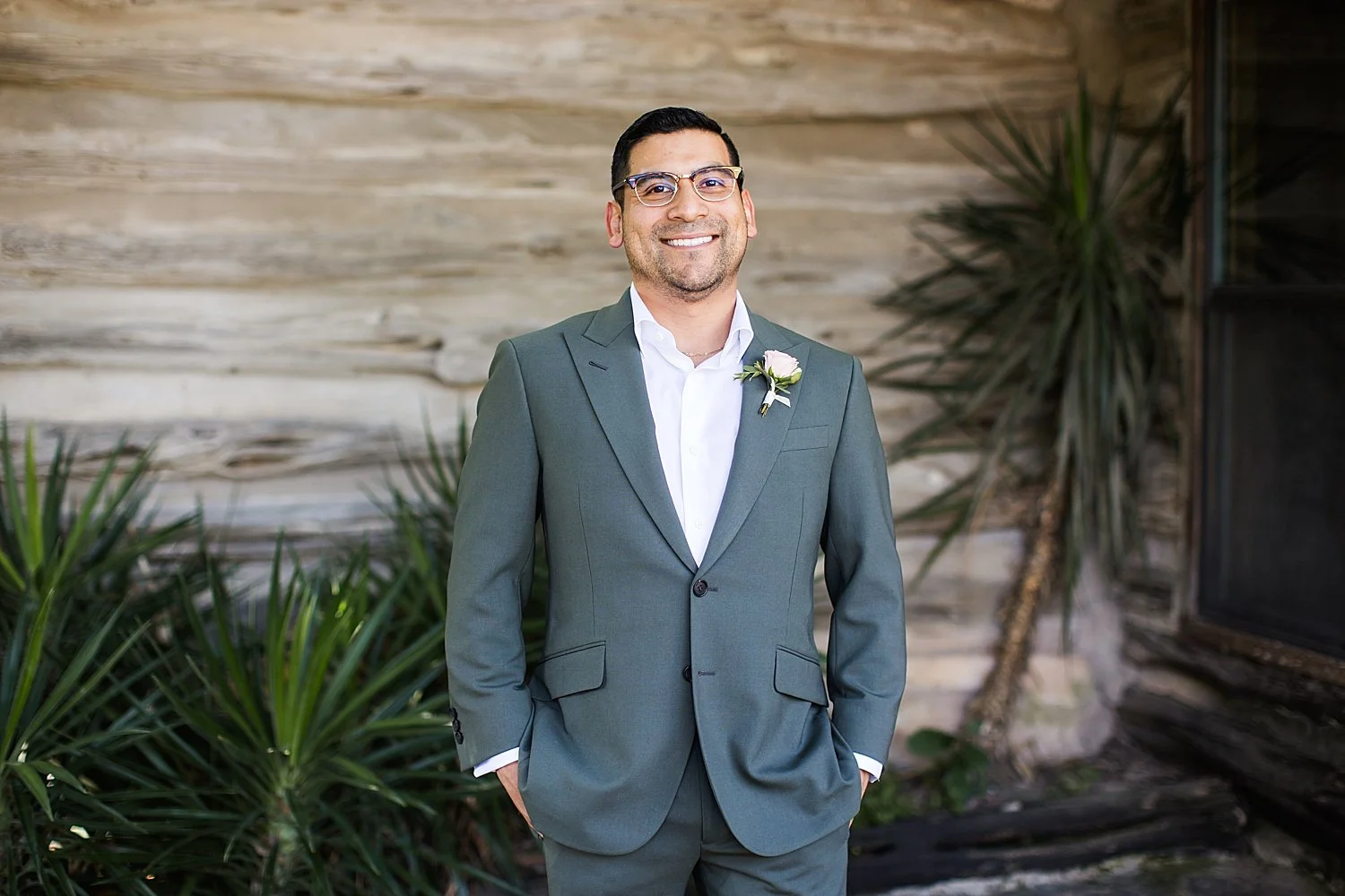 groom in gray suit by Shelley Elena Photography