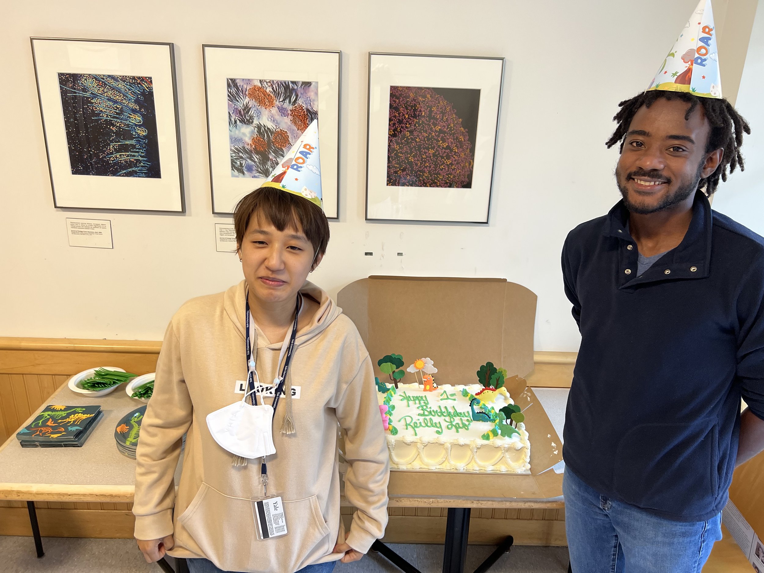 Reilly Lab 1st Birthday Party Je Won and Ovaun guarding cake