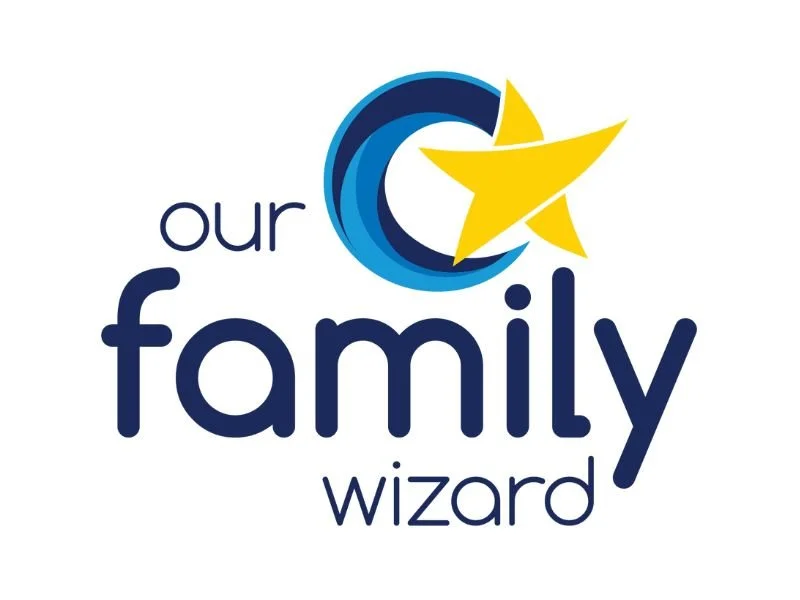 Logo for 'Our Family Wizard' featuring a stylized star and crescent moon in blue and yellow.