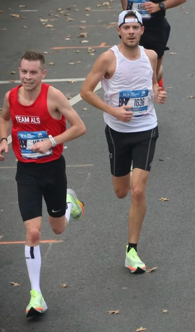 Jeffrey and Brian running the NYC Marathon. 