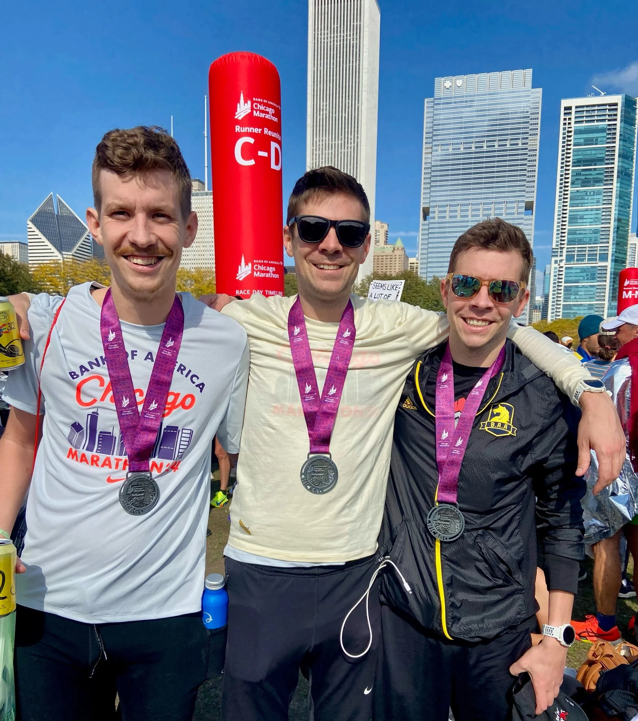 Post 2024 Chicago Marathon with brothers Josh and Brian