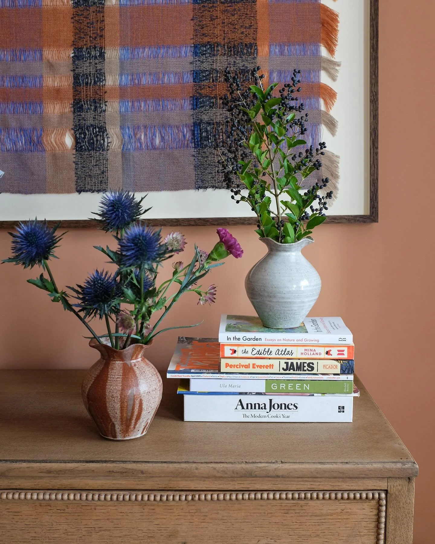 Softly bellied vases with pinched tops into gently waves, featuring @wovenform and her beautiful textiles 〰️

.
#ceramics #pottery #vase #handmadevase #ceramicvase #homedecor #warmneutrals #slowmade #terracotta
