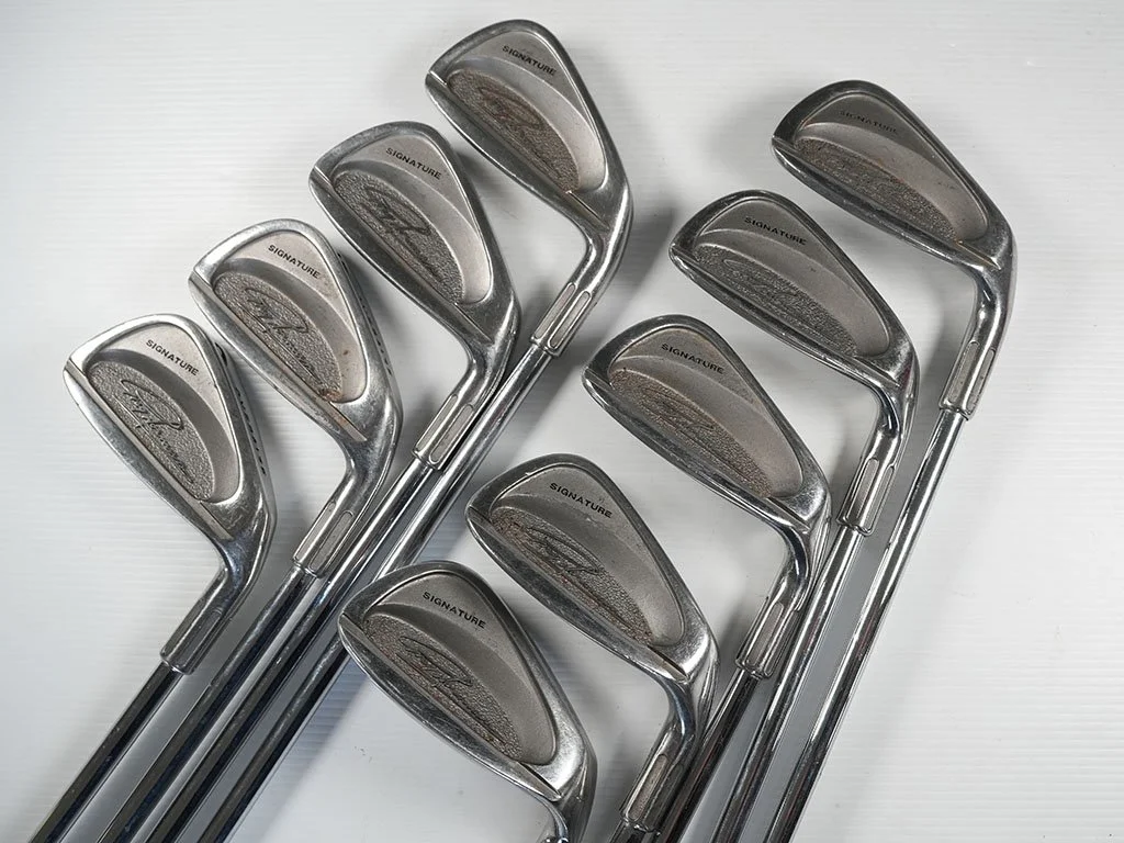 VG. condition  Greg Norman Signature irons 3-SW with True Temper stiff steel shafts.