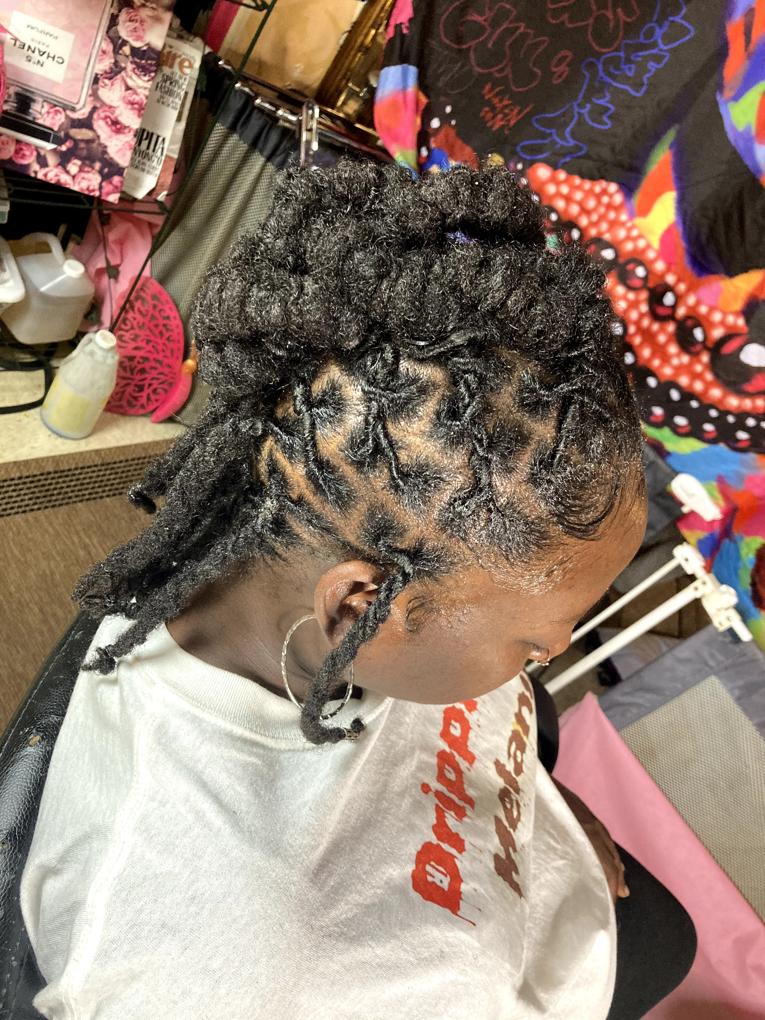 Loc retwist & style