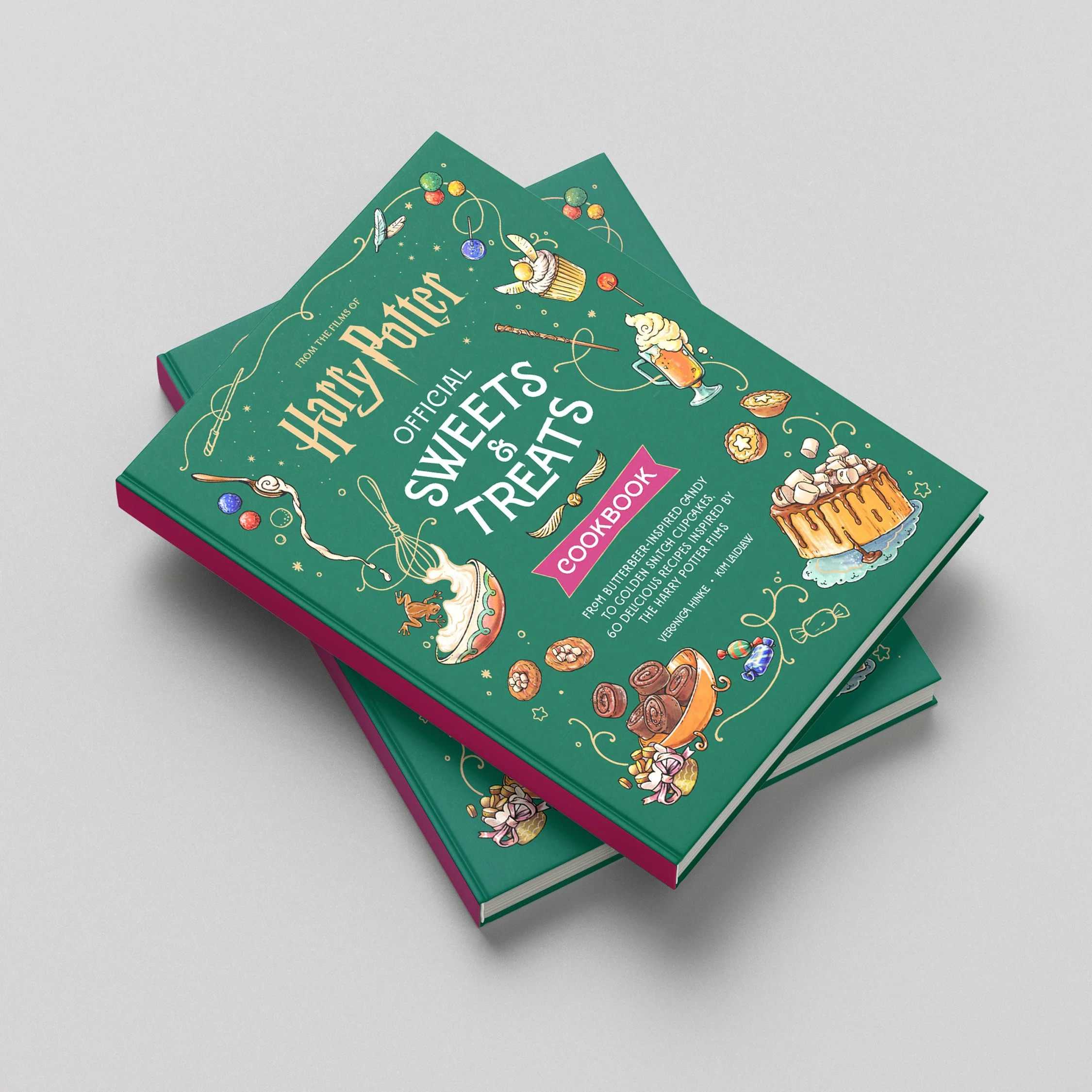 Top corner of a green book titled 'Official Sweets of Wicket & Treats Cookbook' with illustrations of desserts, a beer mug, and decorative elements on a gray background.