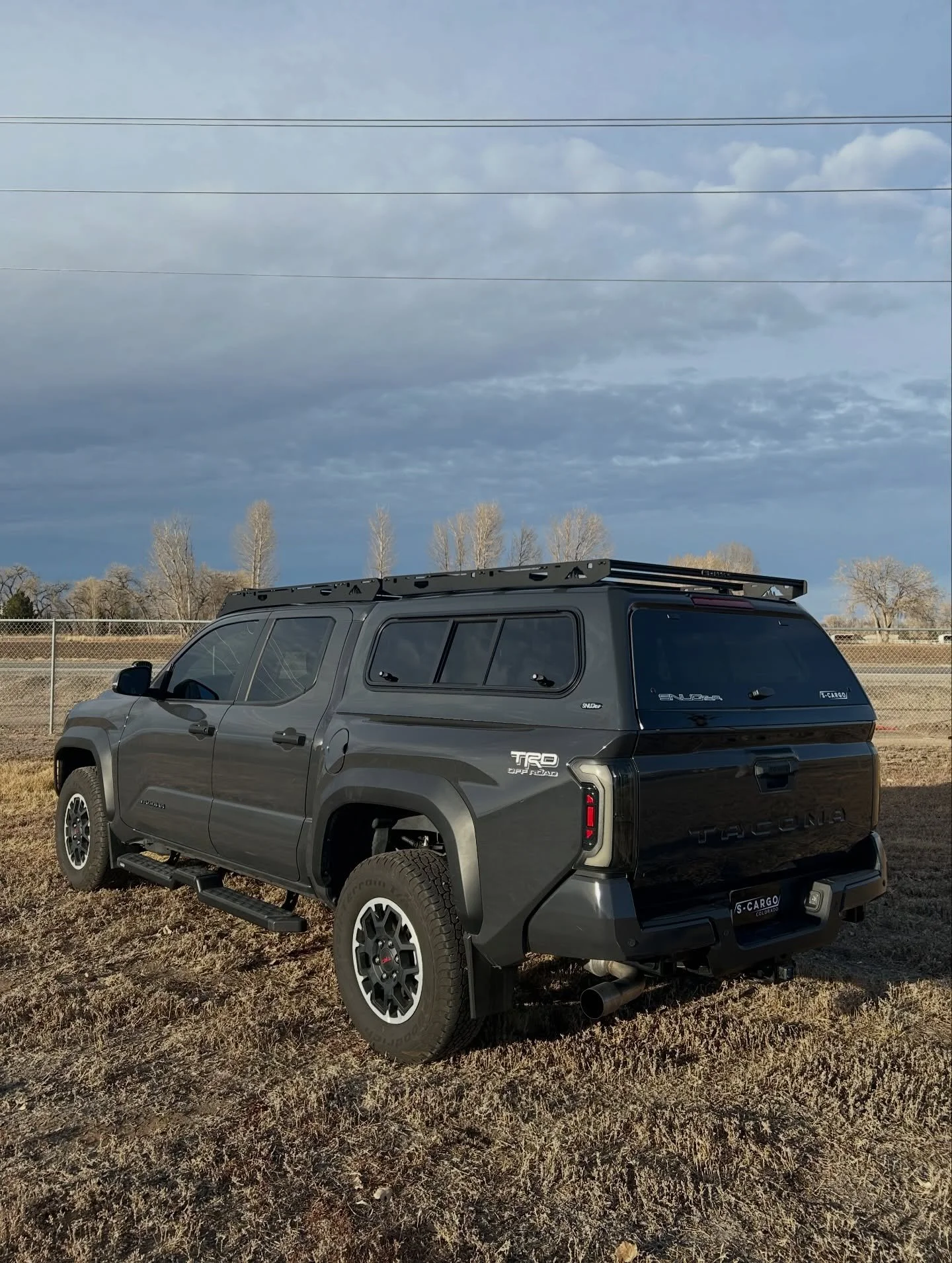 This 4th Gen Toyota Tacoma in Underground is setup with the SnugTop Rebel with Vented Windoors and Rainier and Crow&rsquo;s Nest racks from Sherpa Equipment Co.
