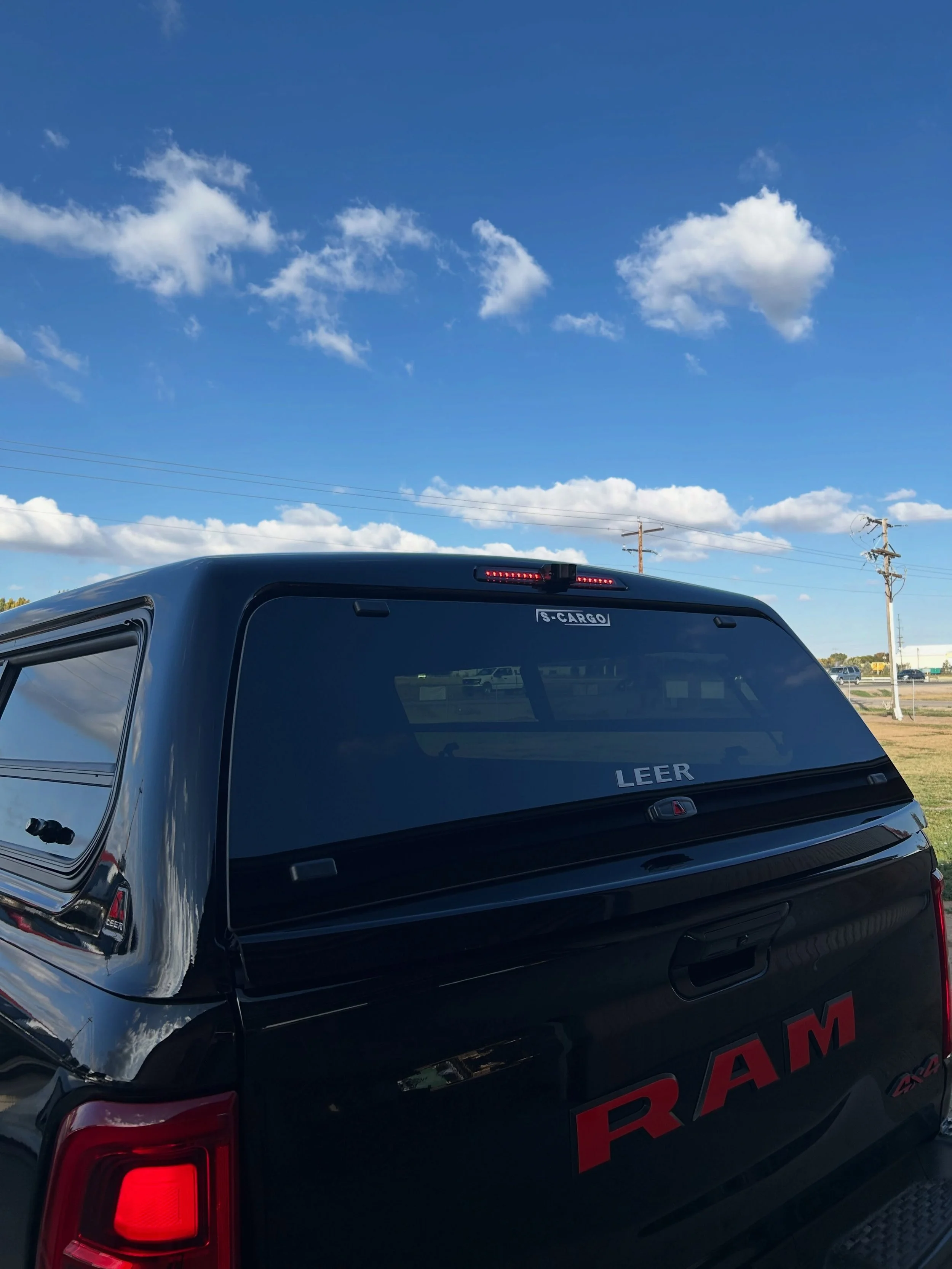 Awesome new feature available for RAM and Chevy/GMC owners with the Digital Rear View Mirror systems!

Have you been thinking about a cap, but didn&rsquo;t want to lose your stock DRVM functionality? 

We can now integrate your LEER or Century cap wi