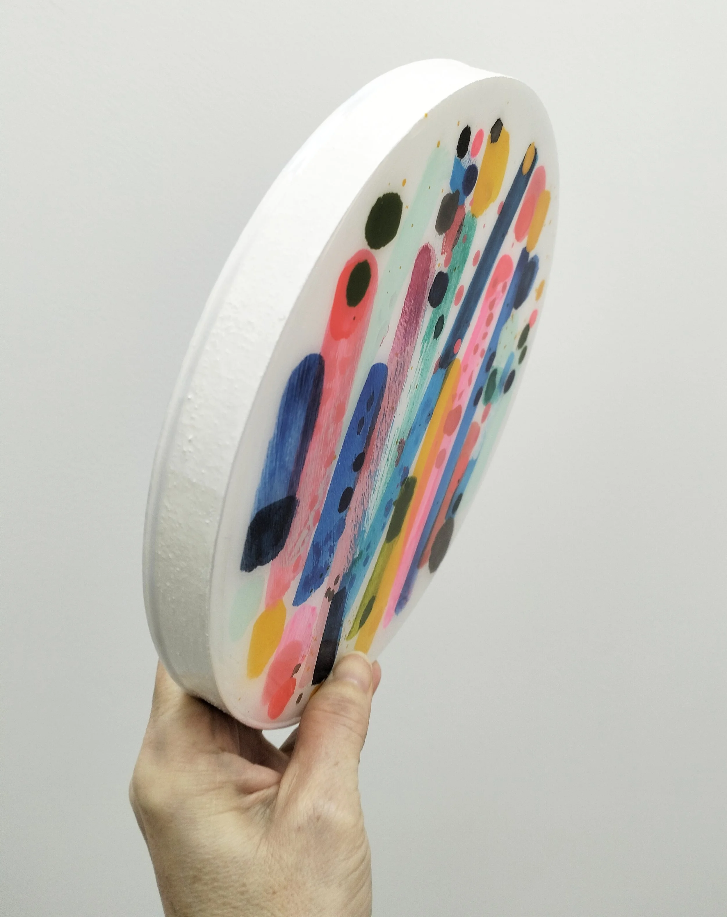 20cm round-'Love Potion'-side view-$350- ink ,acrylic on wood with resin.jpg
