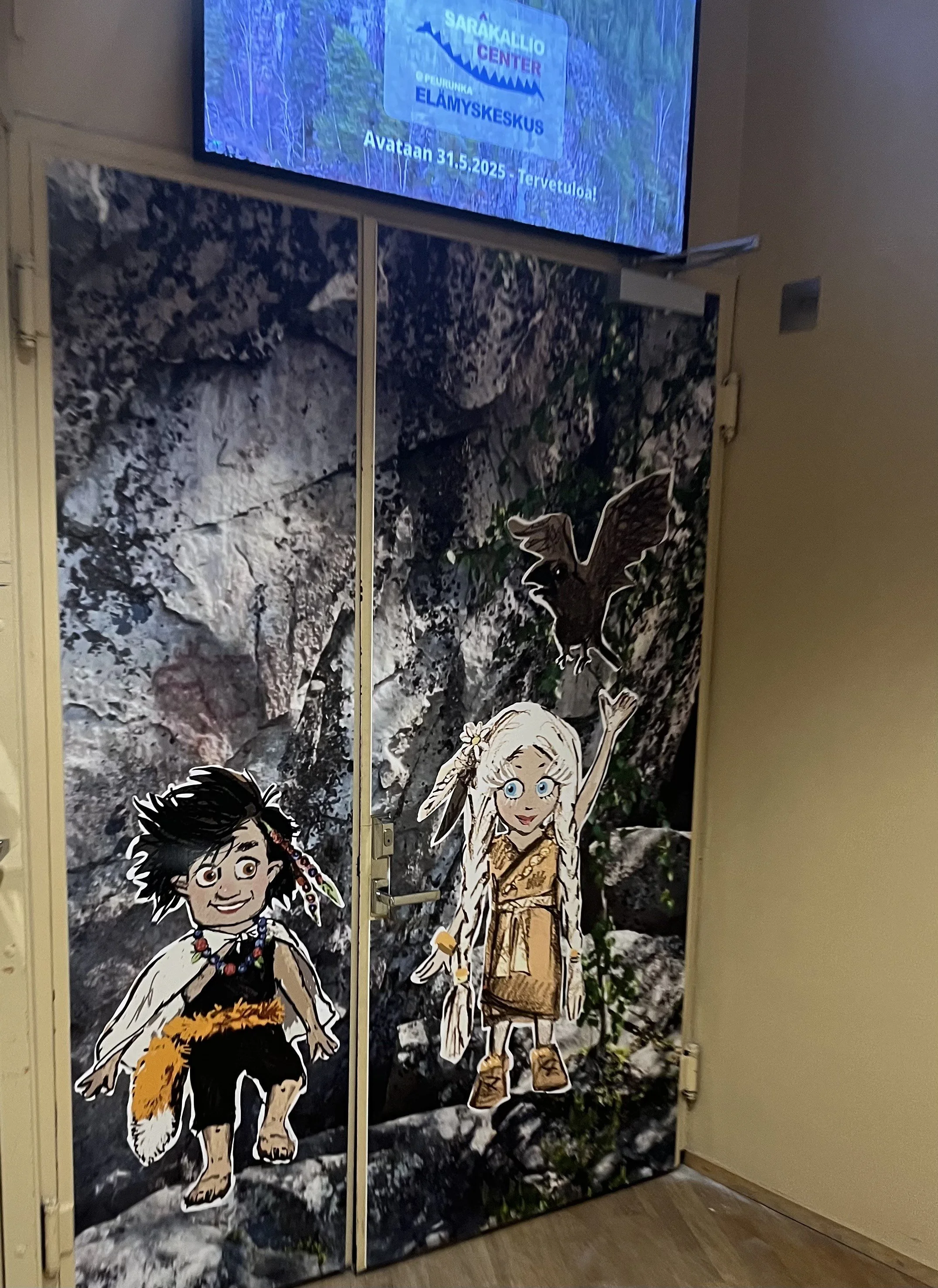 Entrance to Saraakallio Center - Elämyskeskus in Peurunka. Art direction, design & illustration for the project by Erika. Sarâ & Leri characters copyright Erika Reponen