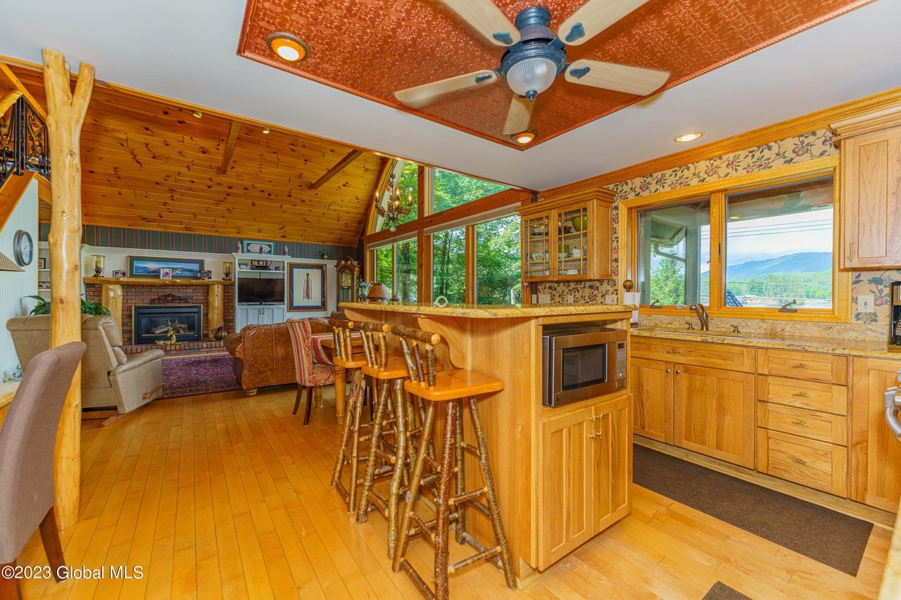 High End Kitchen open to Dining room and Living Room
