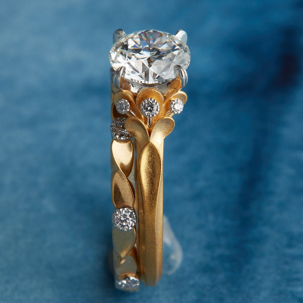 Wildflower collection. Delicate, elegant, artistic, original, beautiful, balanced, handcrafted, unique, diamond engagement rings from master fine jeweler Tim of TW McClelland TWM. Gold and platinum.