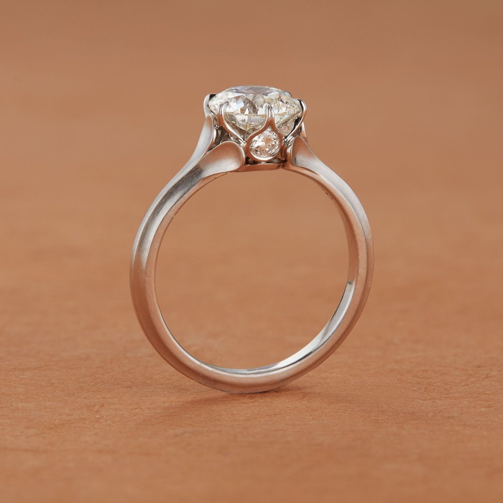 Wildflower collection. Delicate, elegant, artistic, original, beautiful, balanced, handcrafted, unique, diamond engagement rings from master fine jeweler Tim of TW McClelland TWM. Gold and platinum.