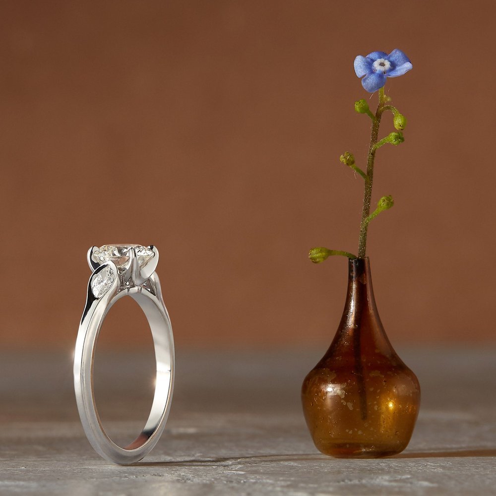 Wildflower collection. Delicate, elegant, artistic, original, beautiful, balanced, handcrafted, unique, diamond engagement rings from master fine jeweler Tim of TW McClelland TWM. Gold and platinum.