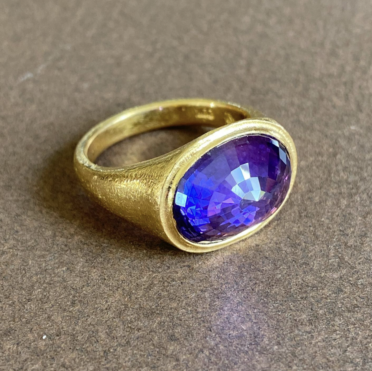 purple sapphire upside down ring.png