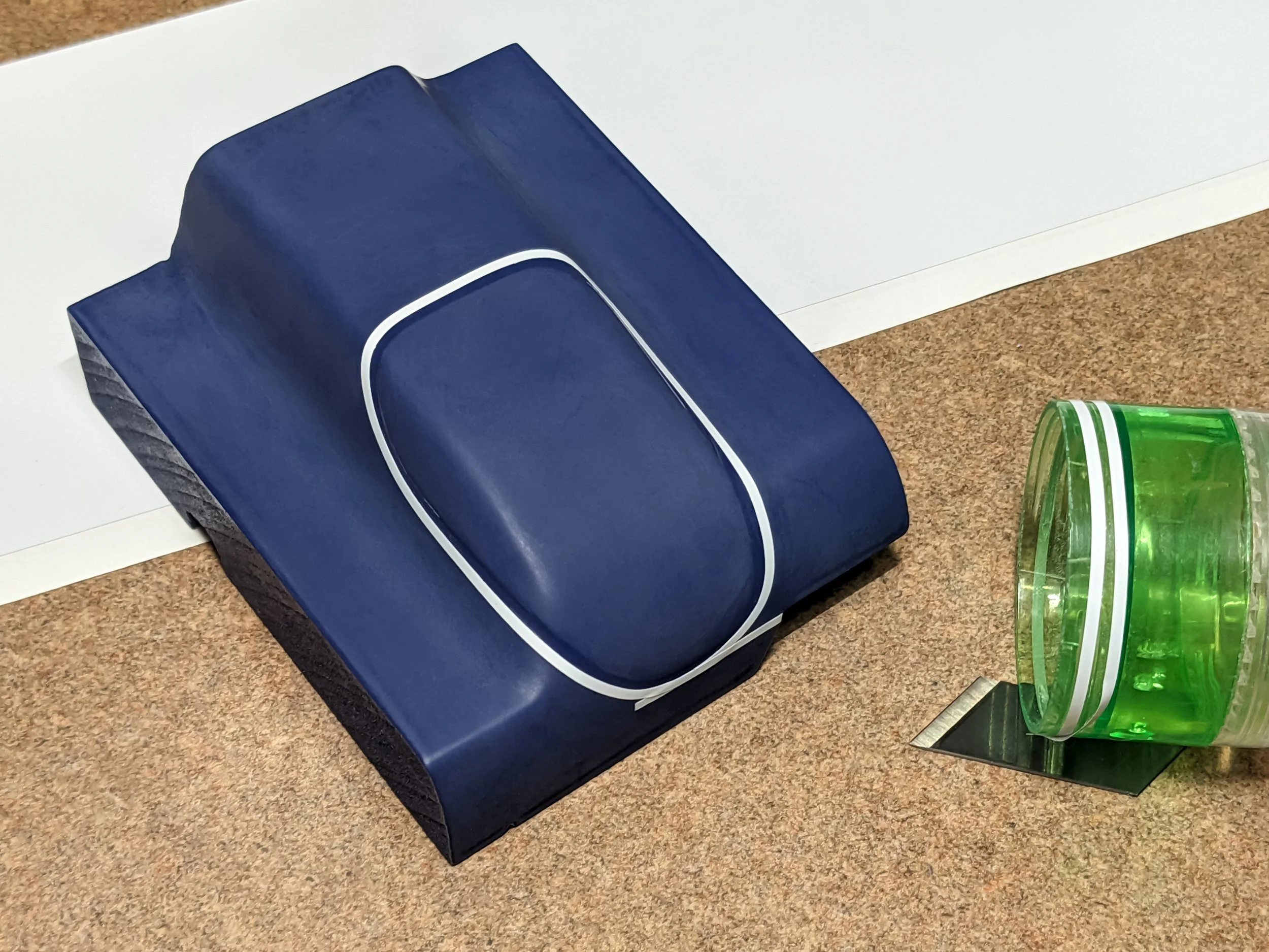 First tape layer to mask Co-Hog Lola T70 headlight before painting